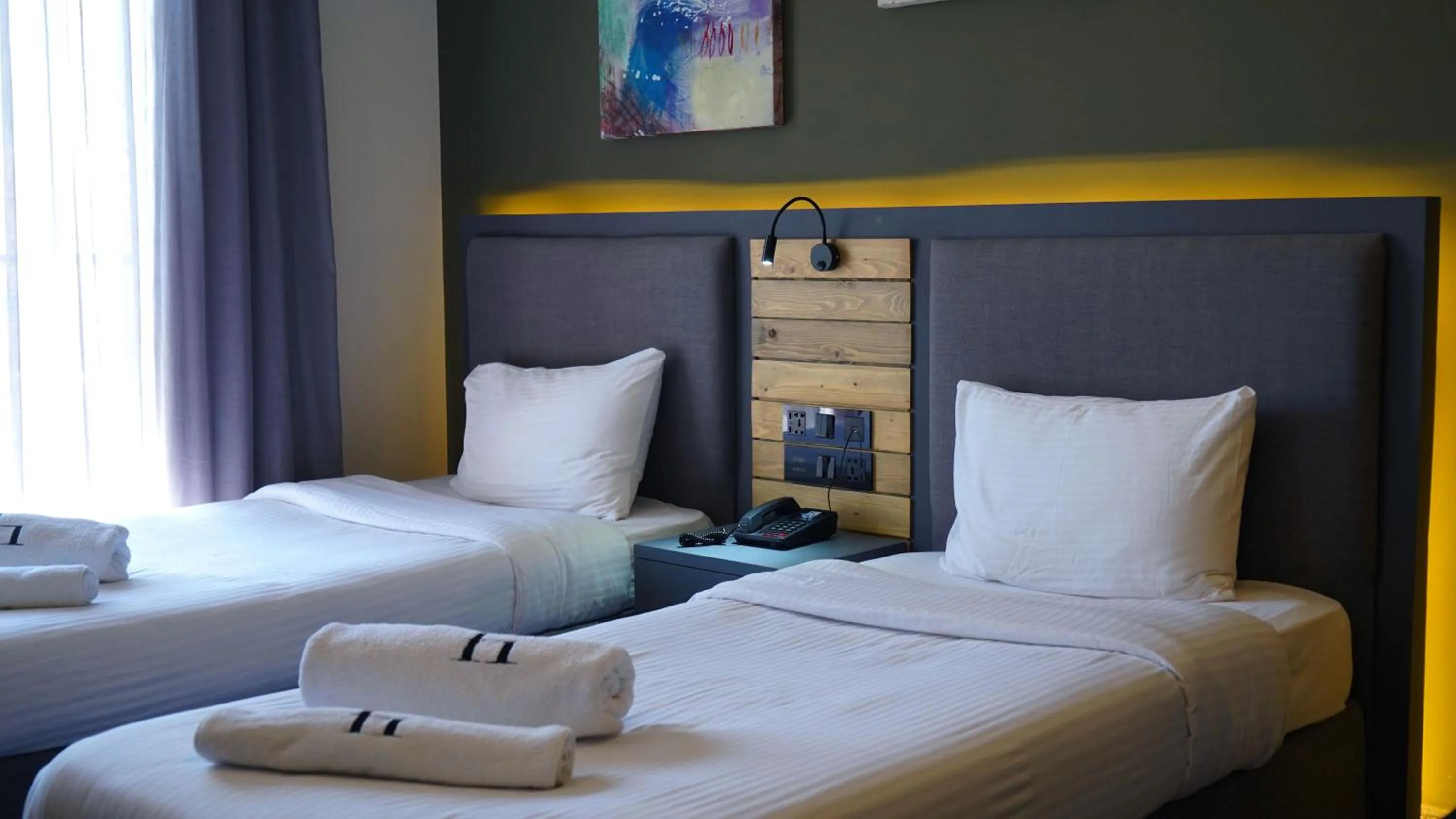 Bed in Aitch Boutique Hotel - an LIH Hotel