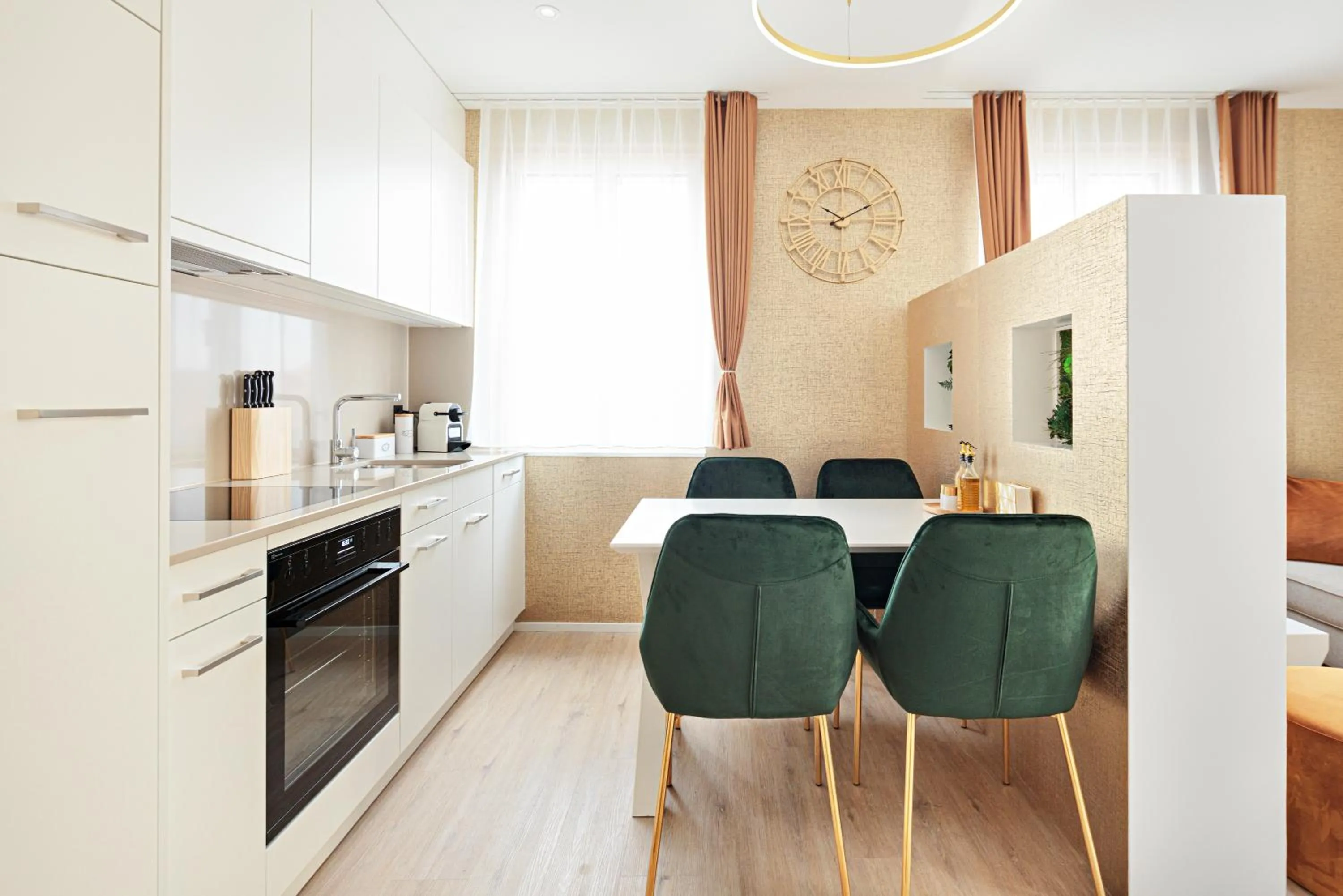 Kitchen or kitchenette in VISIMO Apartments Mühlensteg St Gallen - Elegant Quiet Central