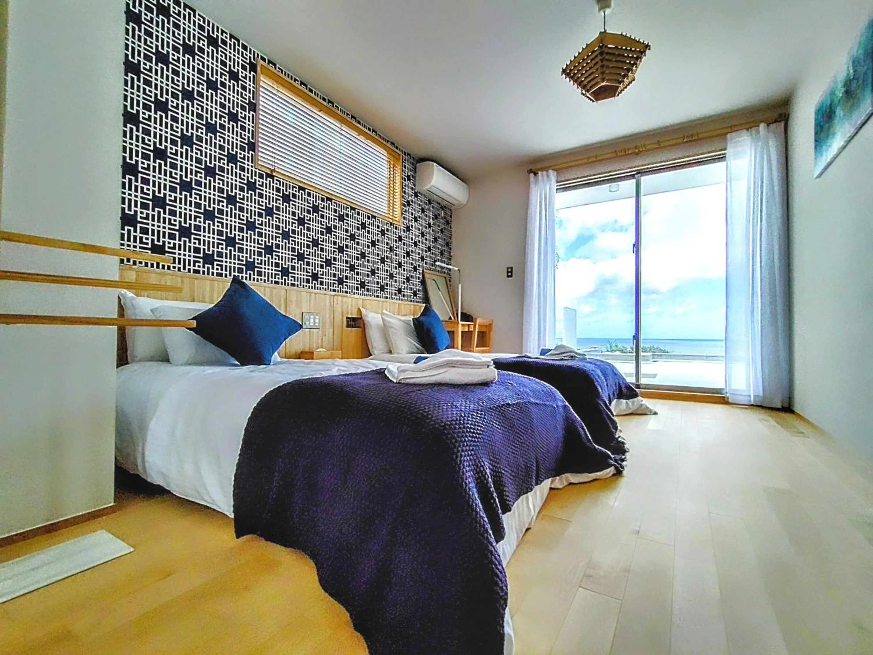 Bed in Ocean View Ishigaki Sora and Umi
