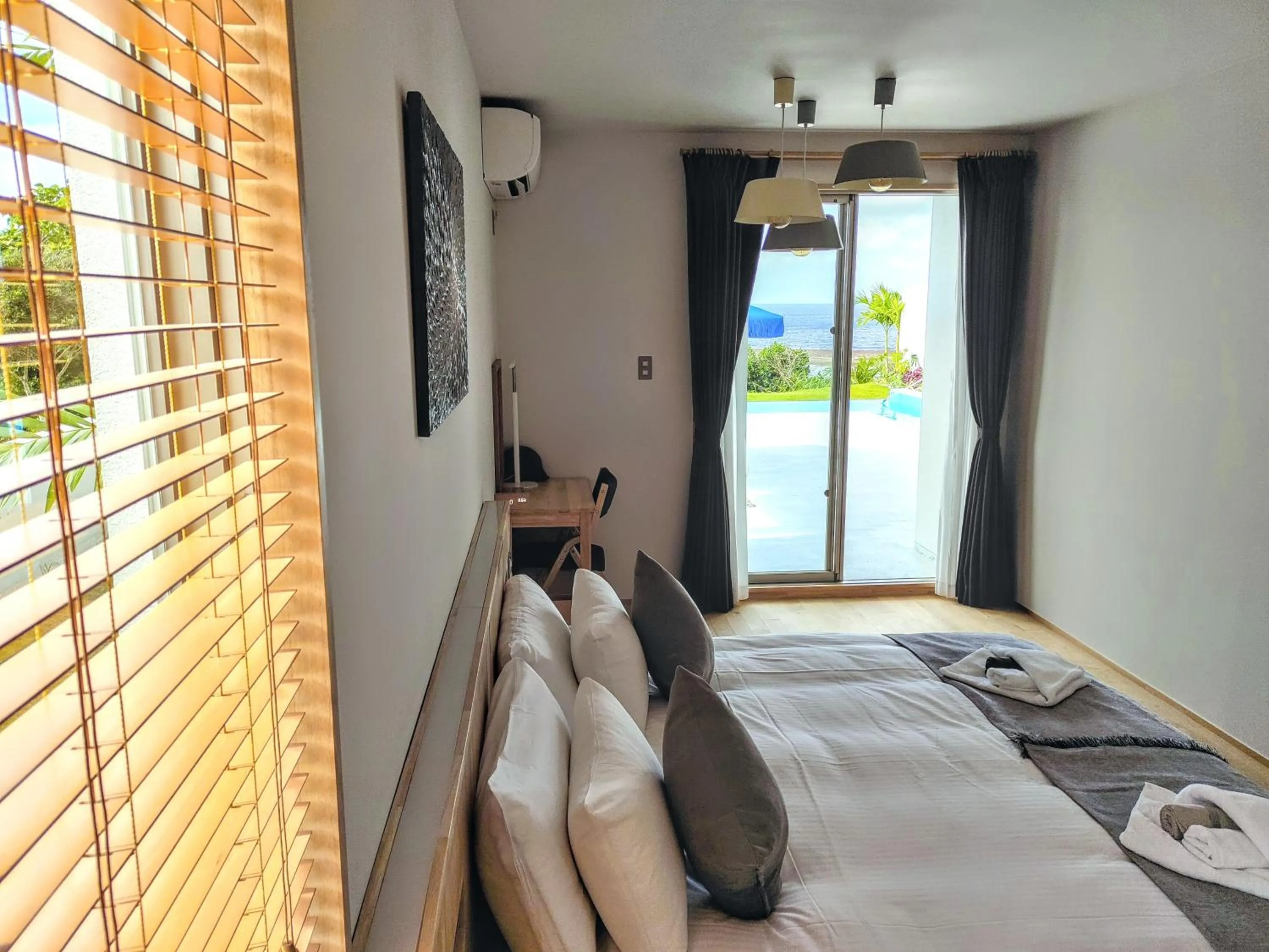 Bed in Ocean View Ishigaki Sora and Umi