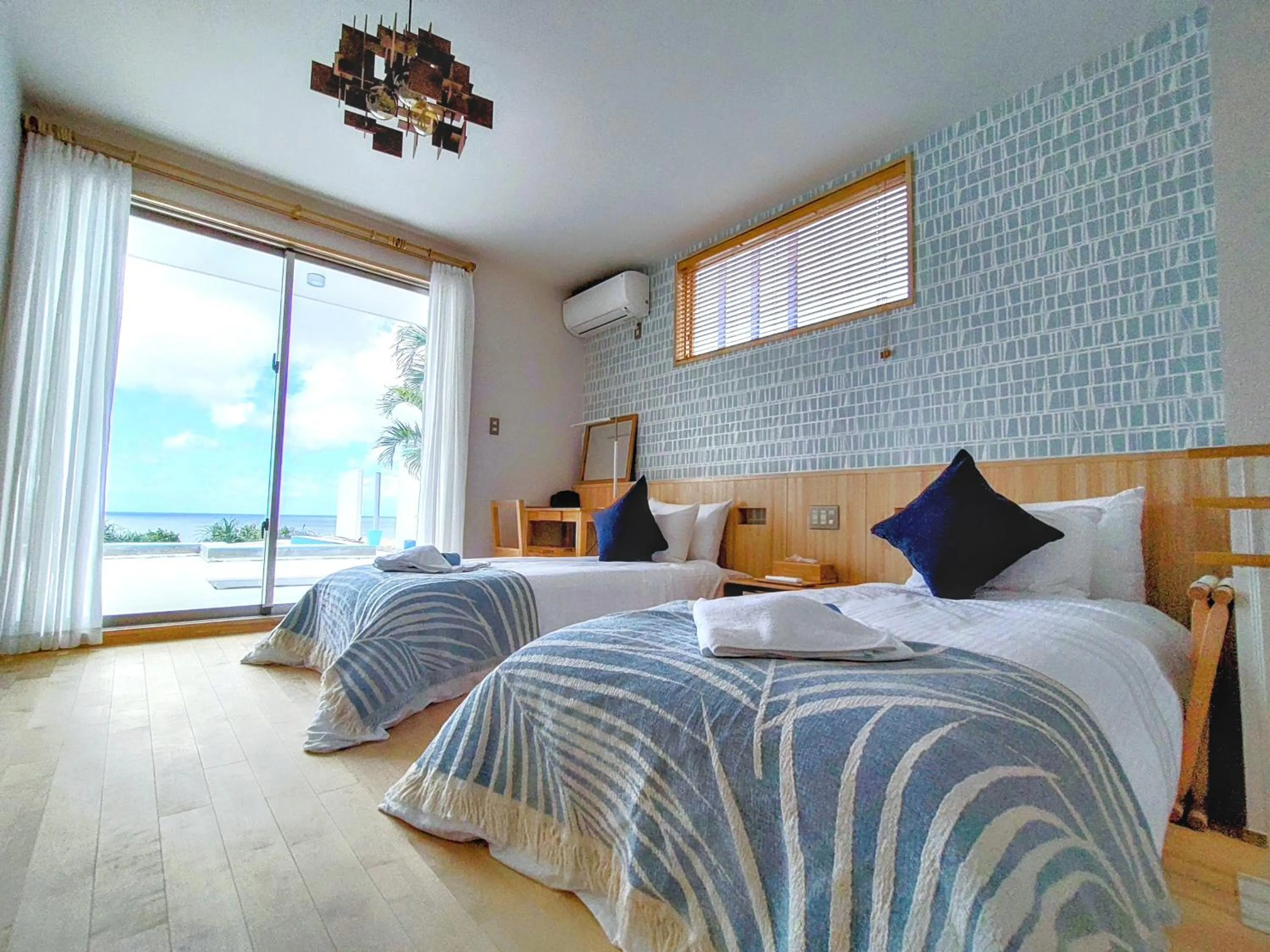 Bed in Ocean View Ishigaki Sora and Umi