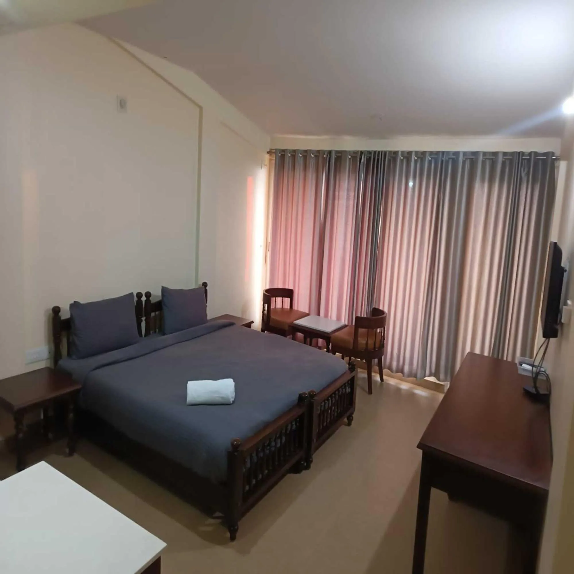 Bed in Baywatch Beach Homes