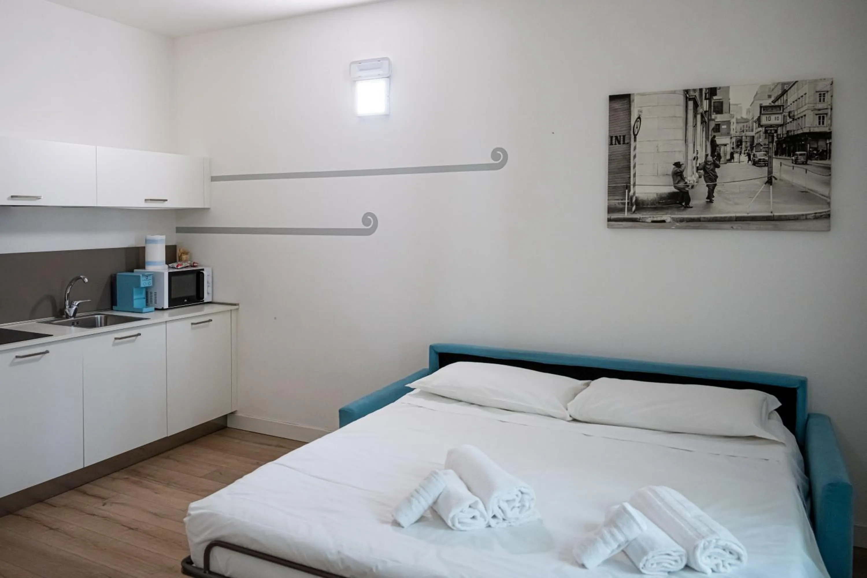 Bed in City Gallery Apartments