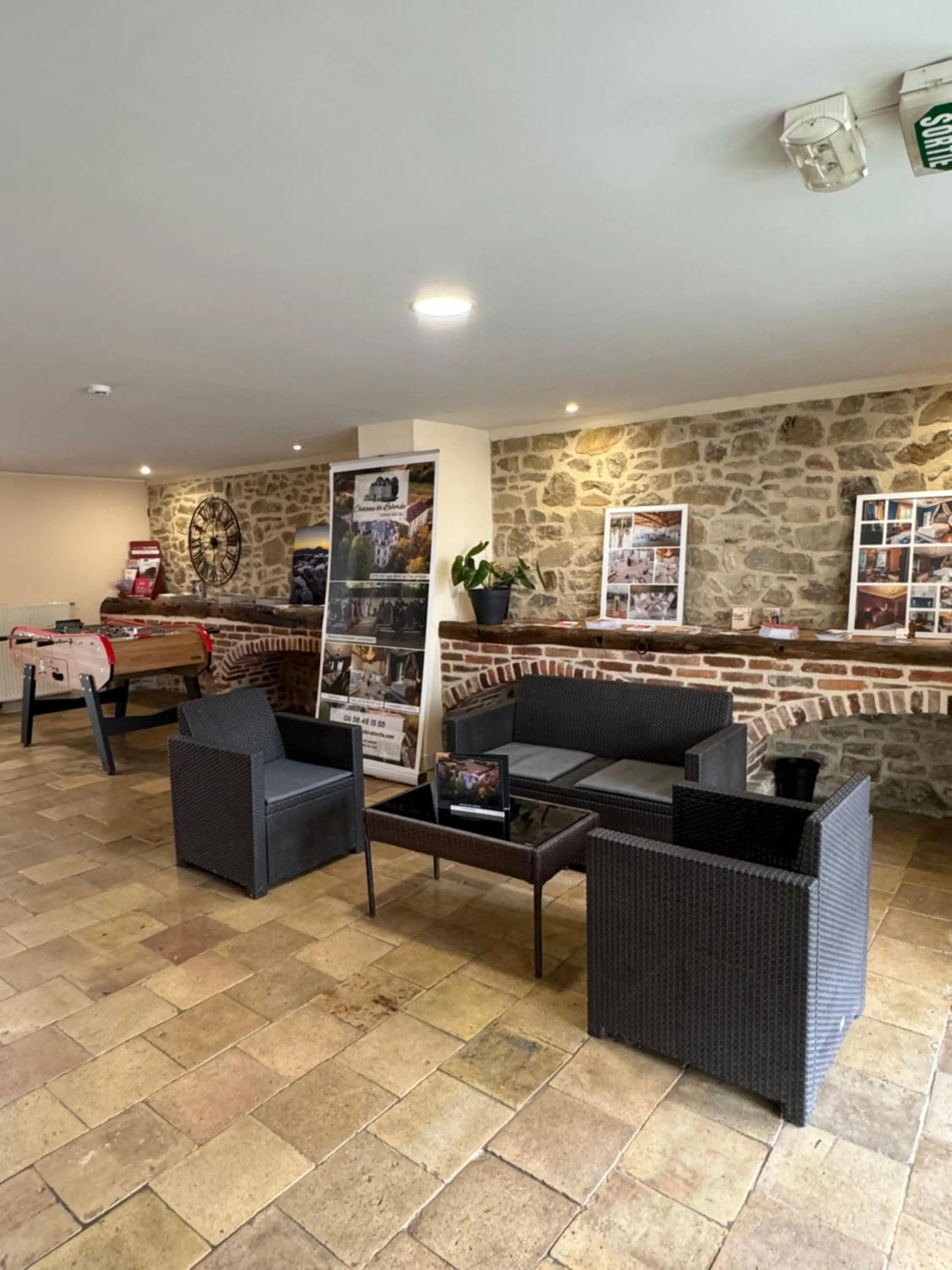 Lobby or reception in Contact Hôtel La Métairie