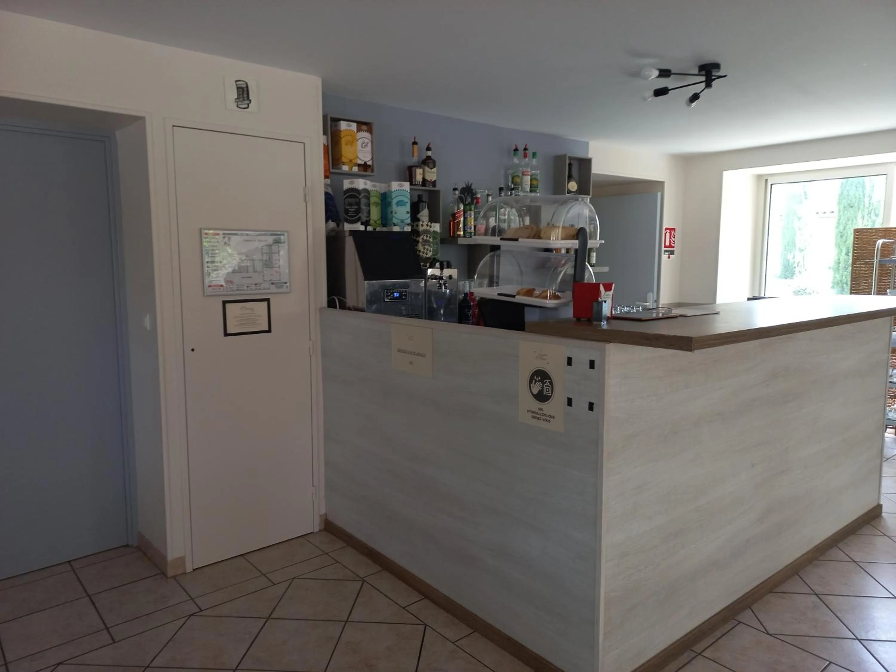 Lounge or bar in Contact Hôtel La Métairie