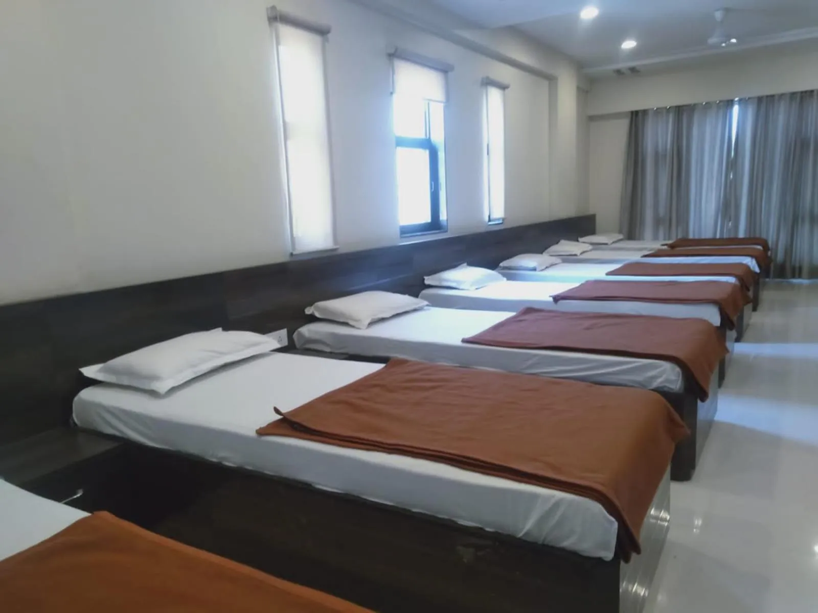 Photo of the whole room, Bed in Sai Heera Residency Shirdi