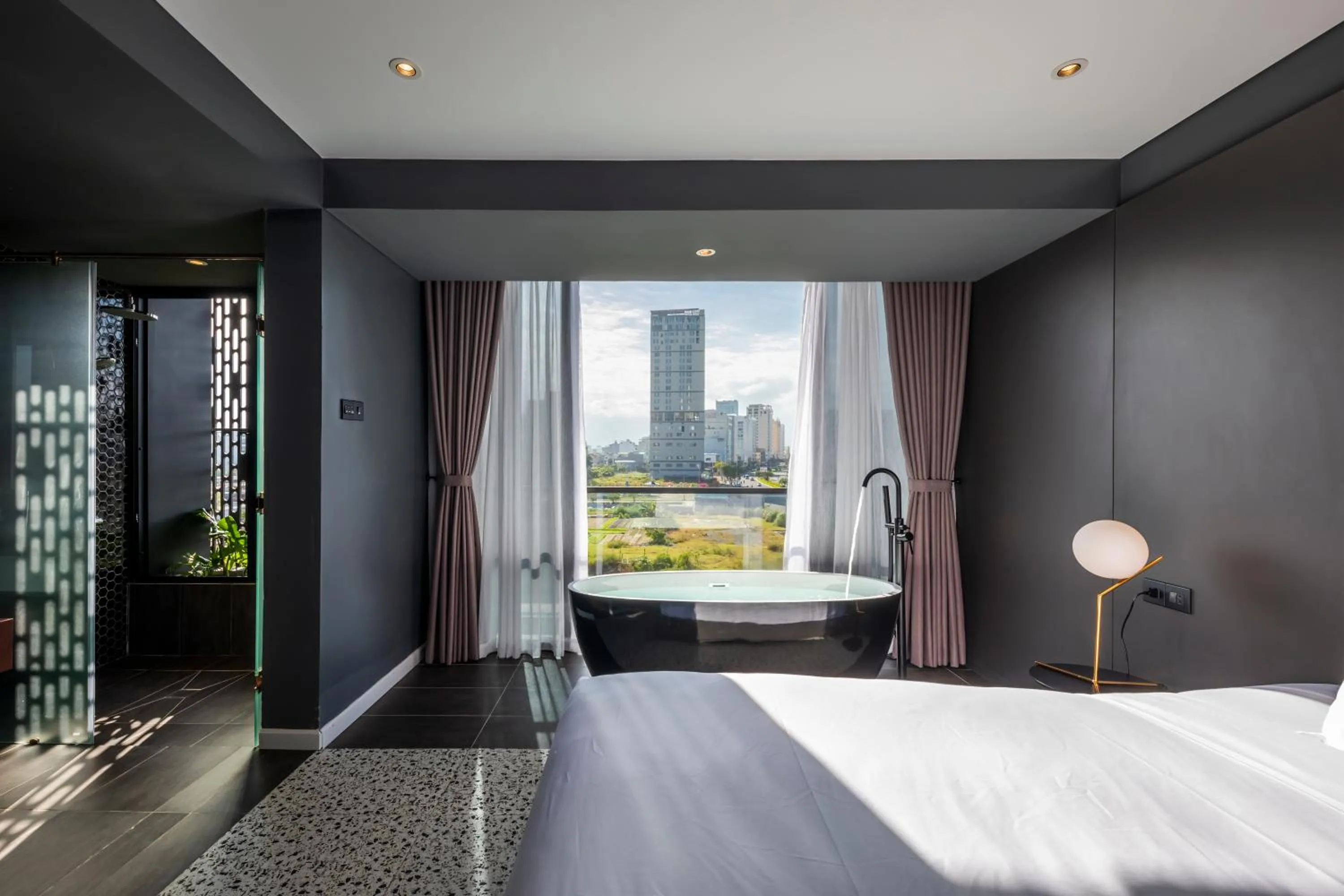 Photo of the whole room, Bed in M92 Boutique Da Nang Beach Hotel