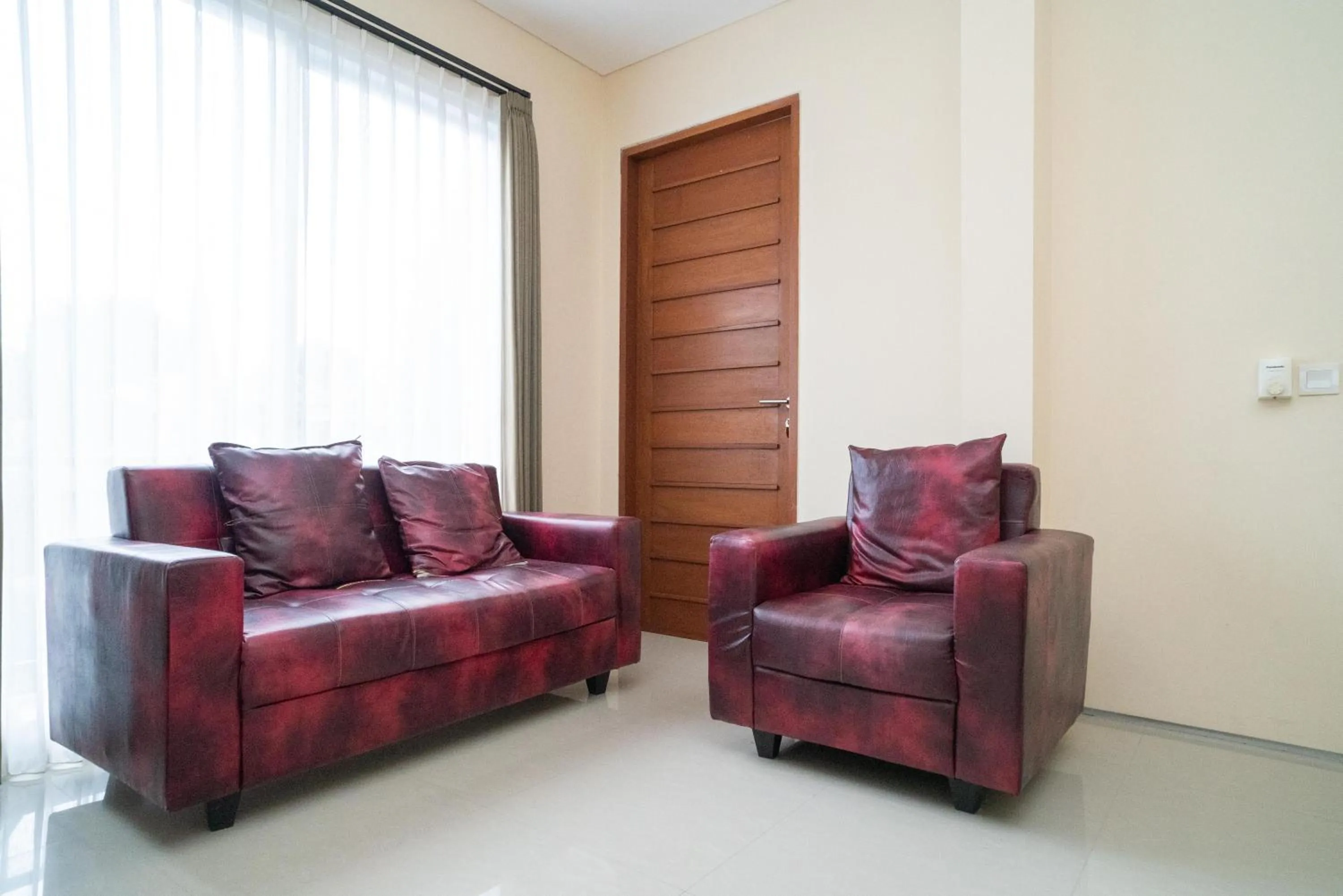 Seating area in RedDoorz near ITDC Nusa Dua