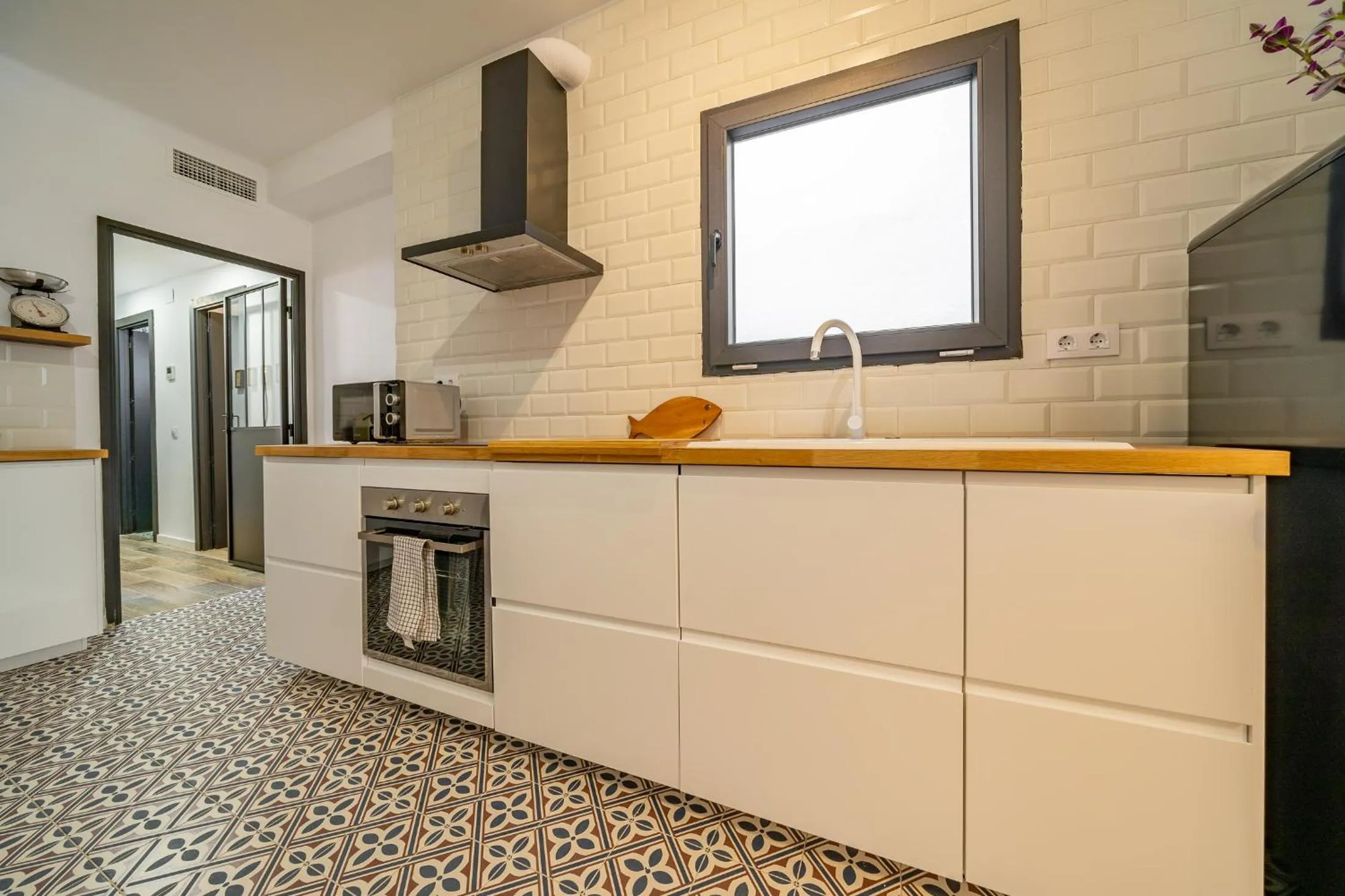 Kitchen or kitchenette in CAN MARTINEZ Calella Beach Boutique Apartment