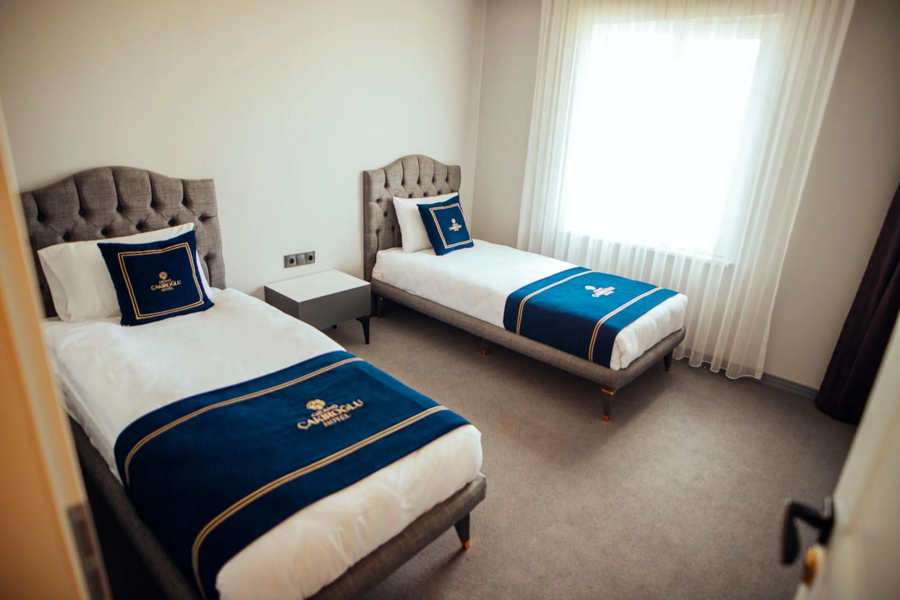 Bed in GRAND ÇAKIROĞLU HOTEL