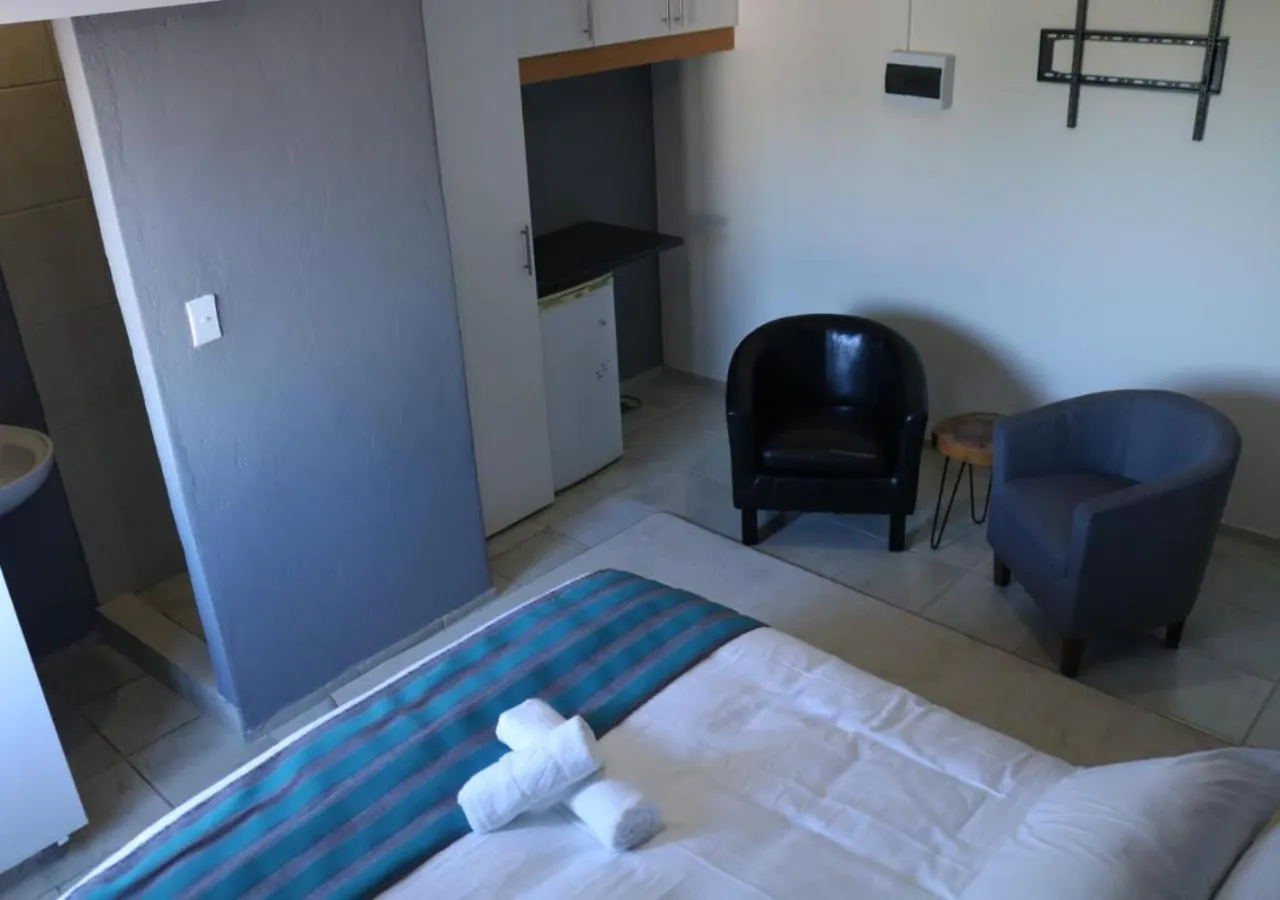 Communal lounge/ TV room in Pixie Lodge