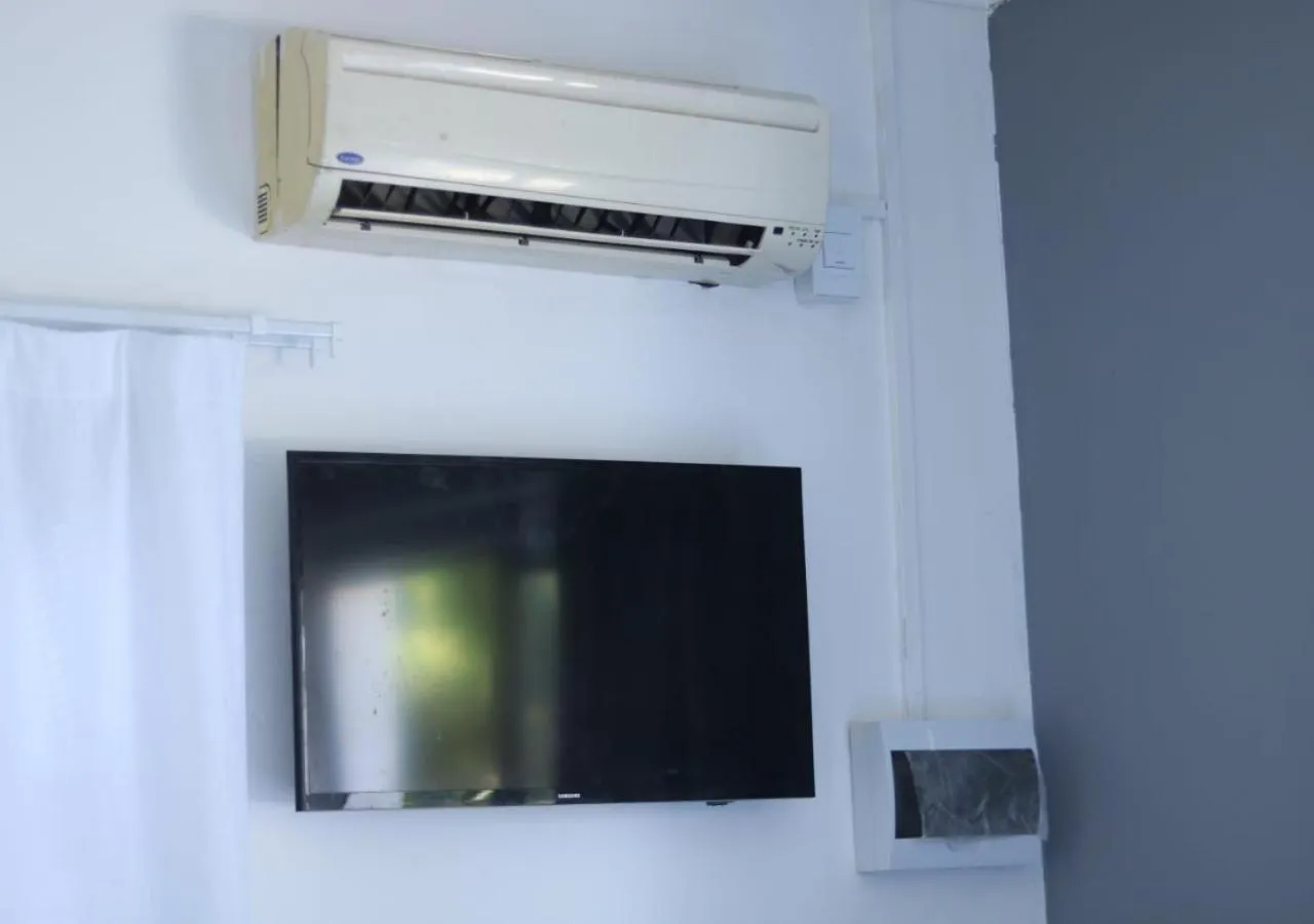 Communal lounge/ TV room in Pixie Lodge