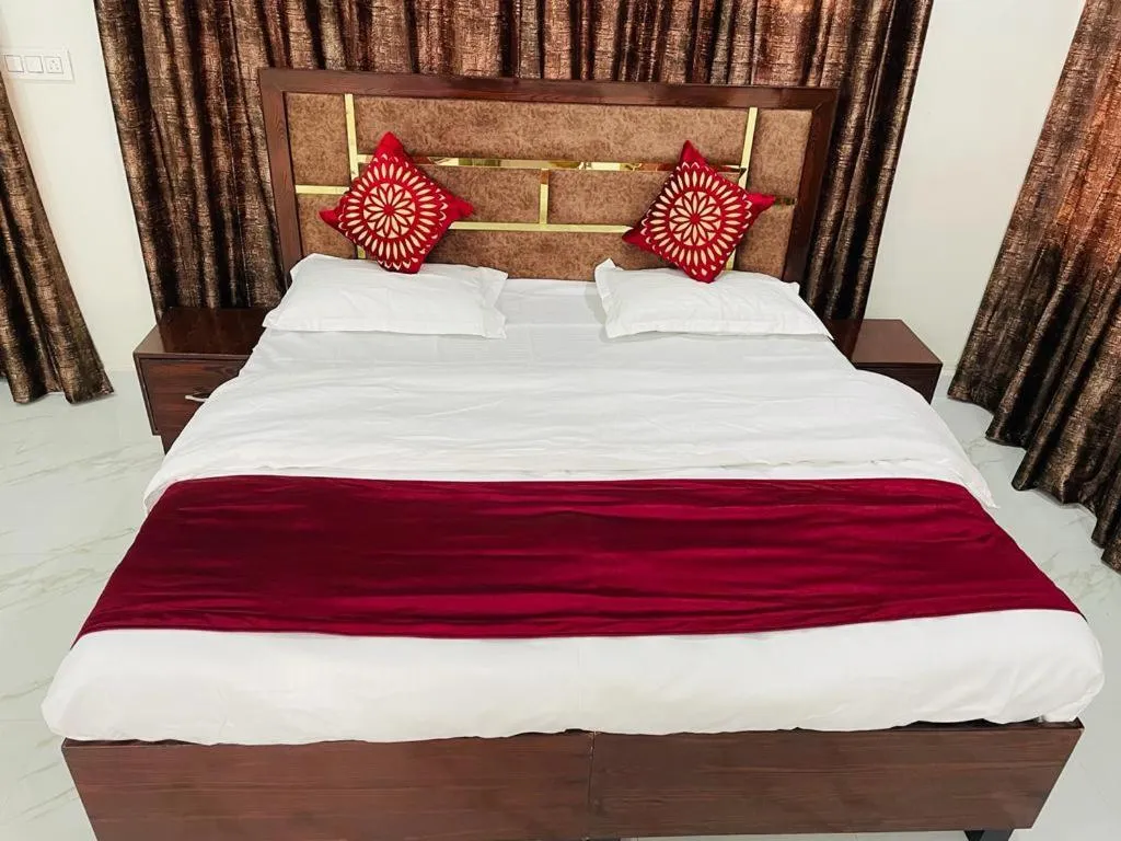 Bed in Zora Park Luxury Rooms