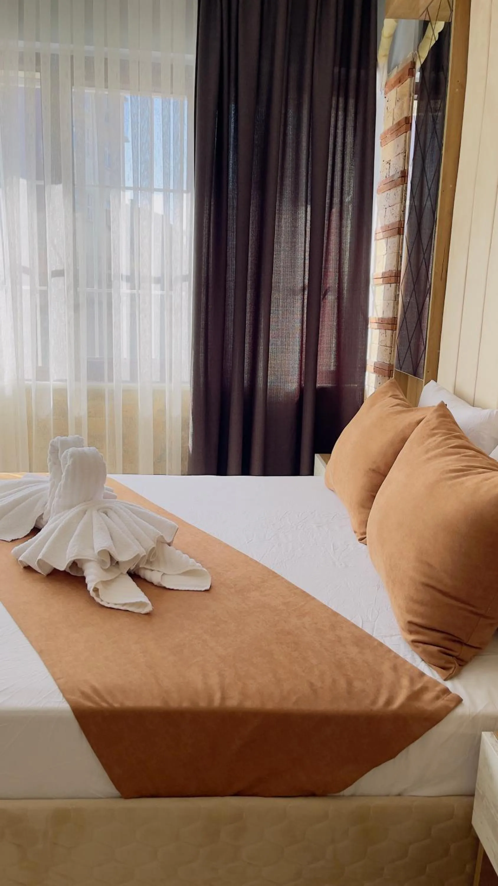 Bed in Lumina Boutique Hotel