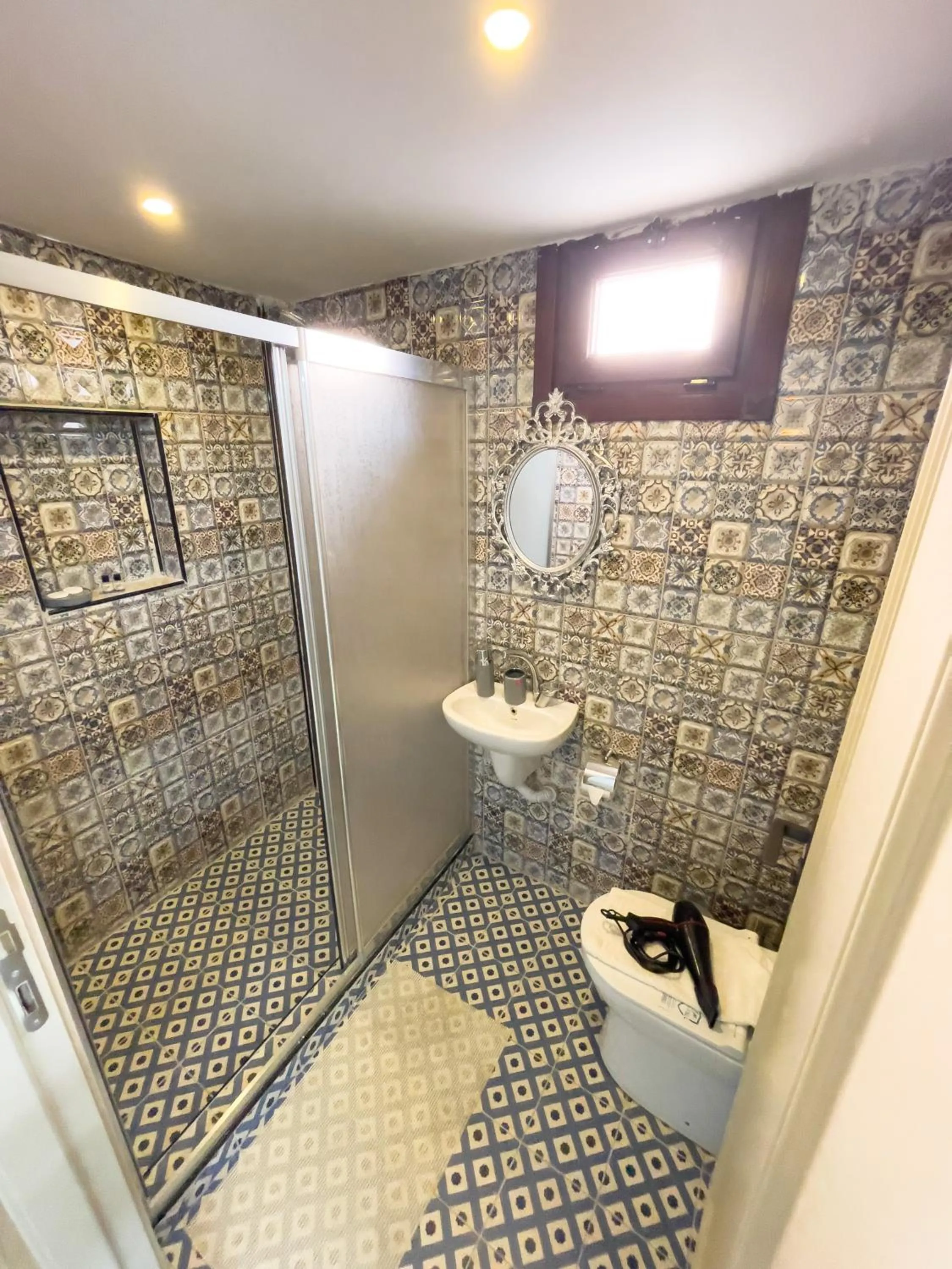 Shower in Lumina Boutique Hotel