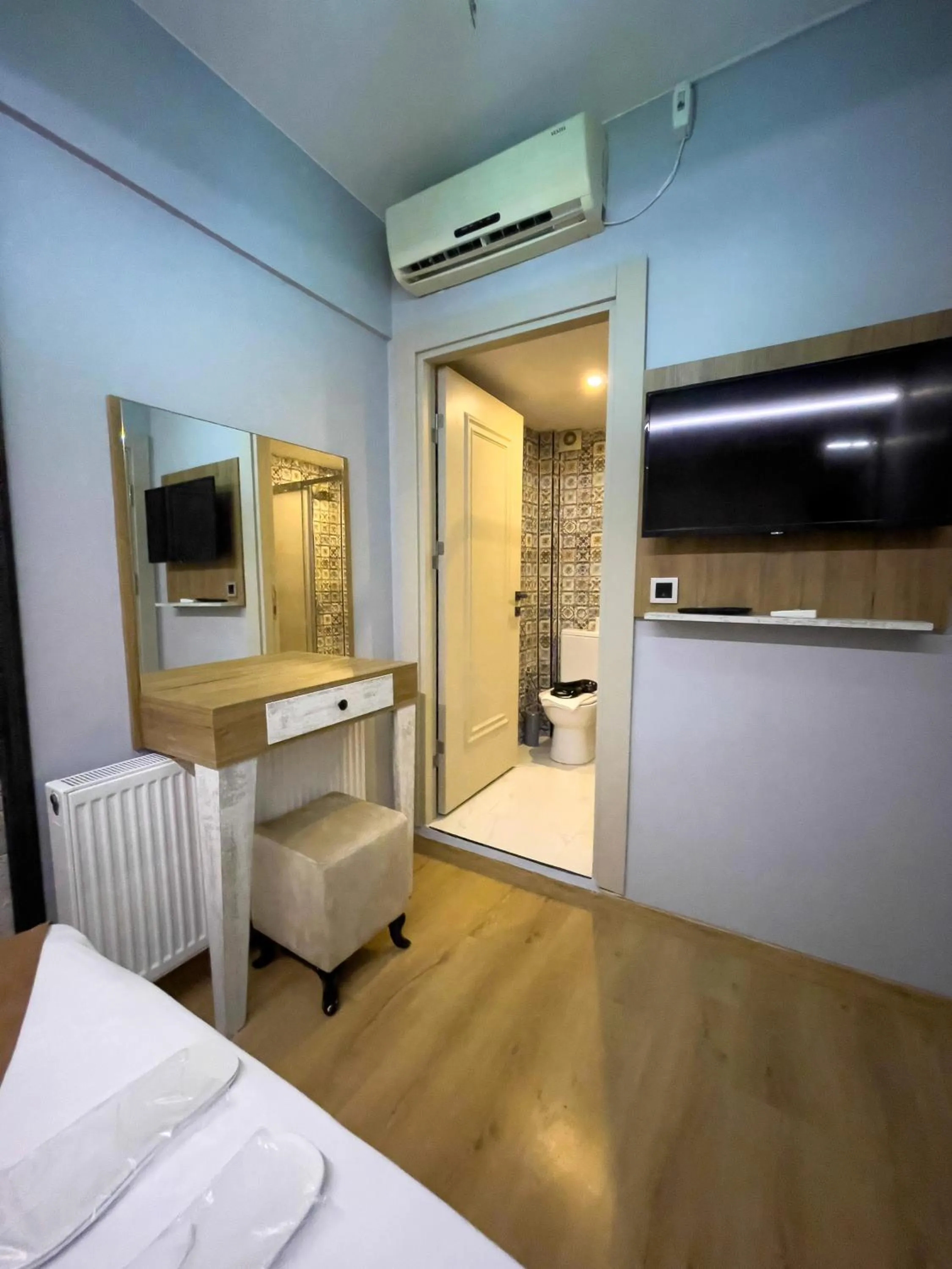 Bed in Lumina Boutique Hotel