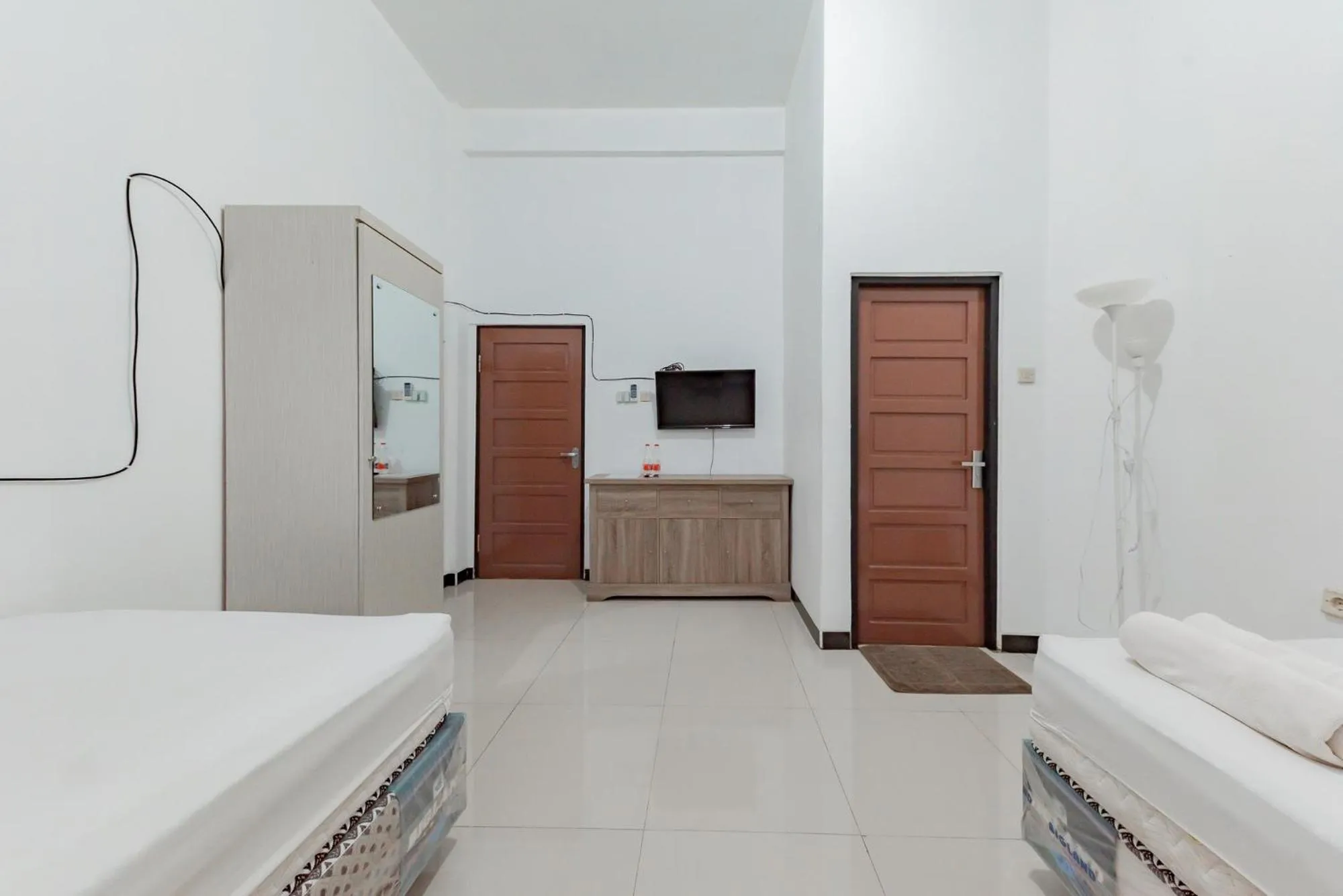 Bedroom, Bed in Urbanview Hotel Syariah 99 Banjarbaru by RedDoorz