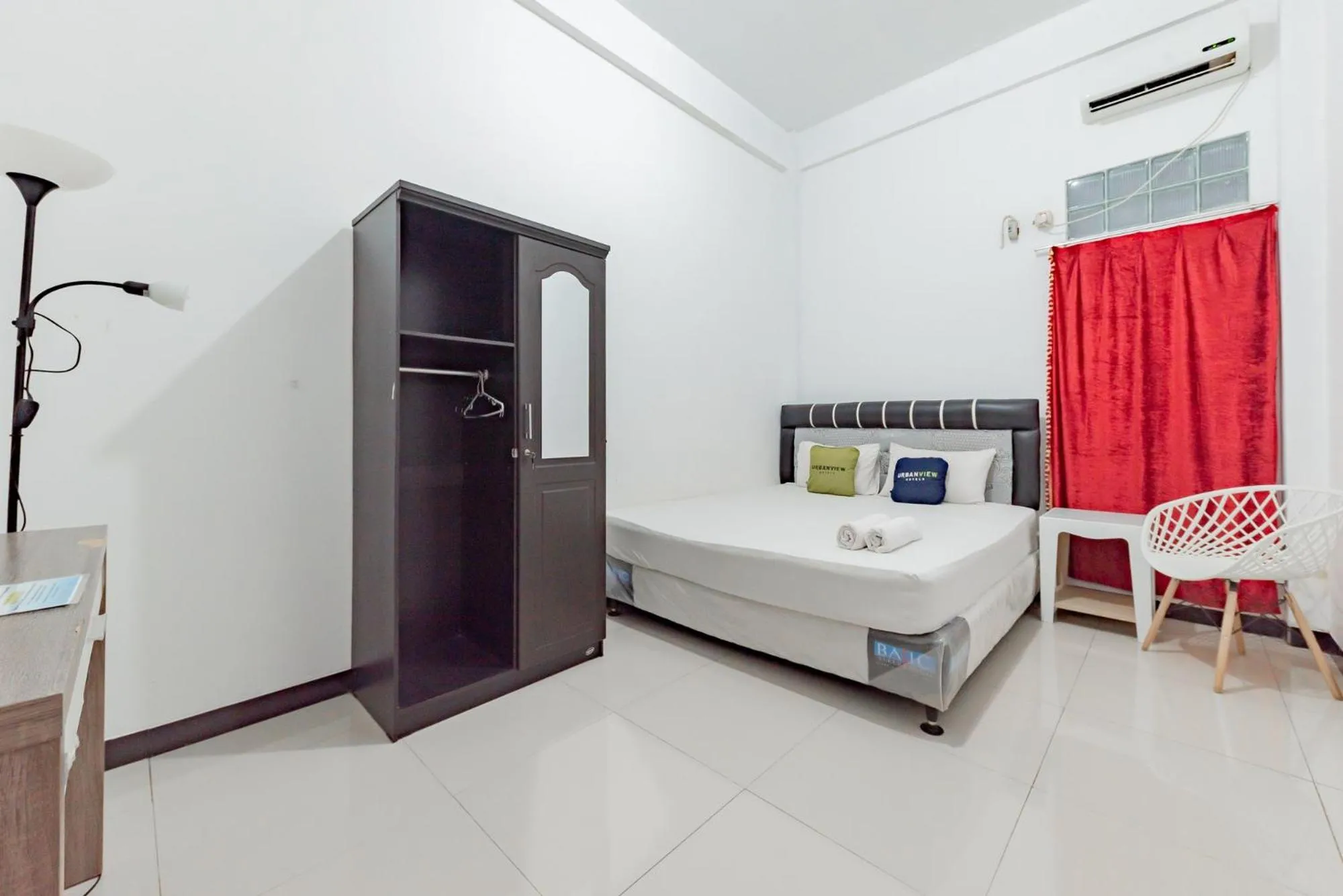 Bed in Urbanview Hotel Syariah 99 Banjarbaru by RedDoorz