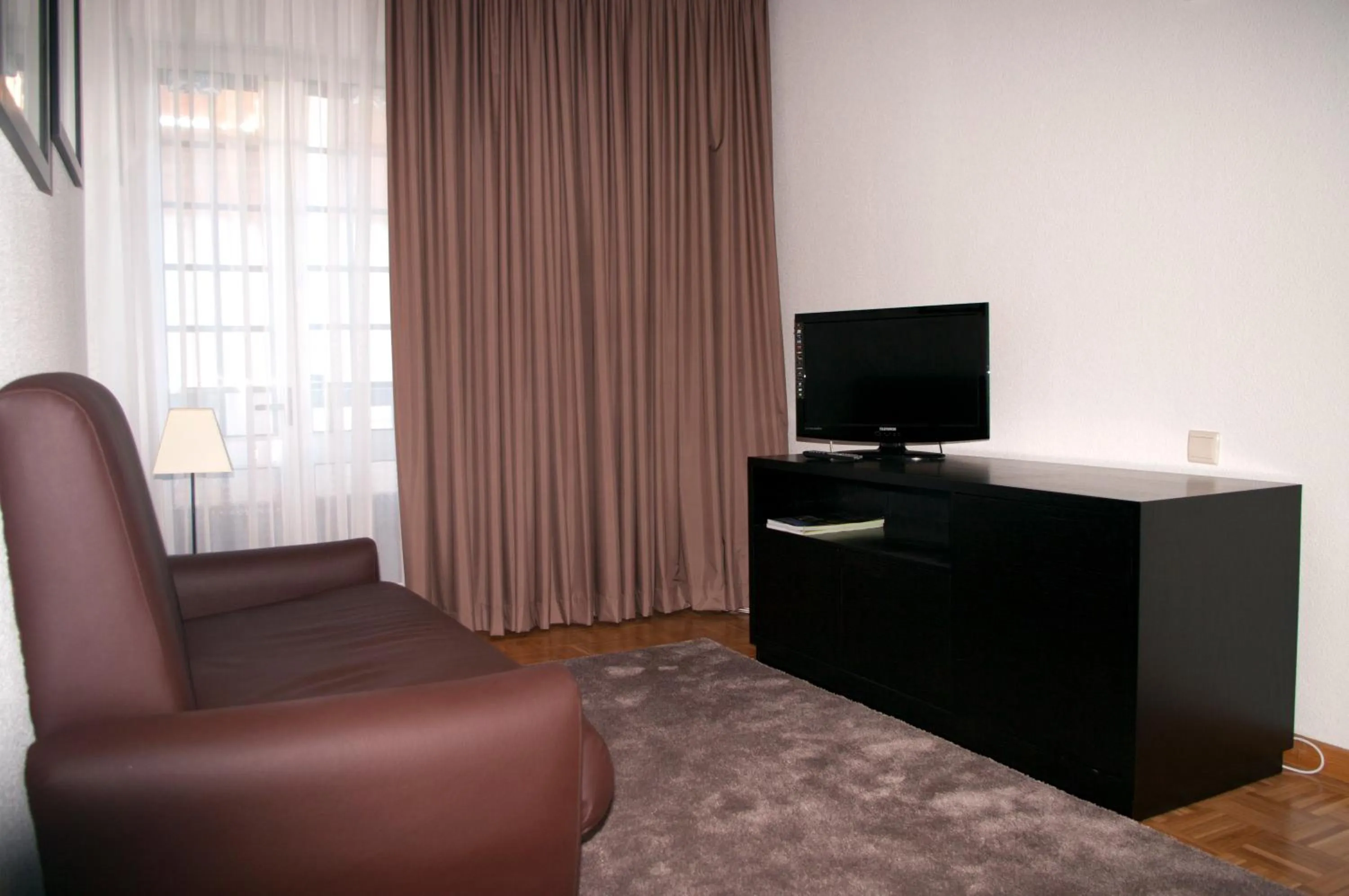 Communal lounge/ TV room in Hotel O Encontro