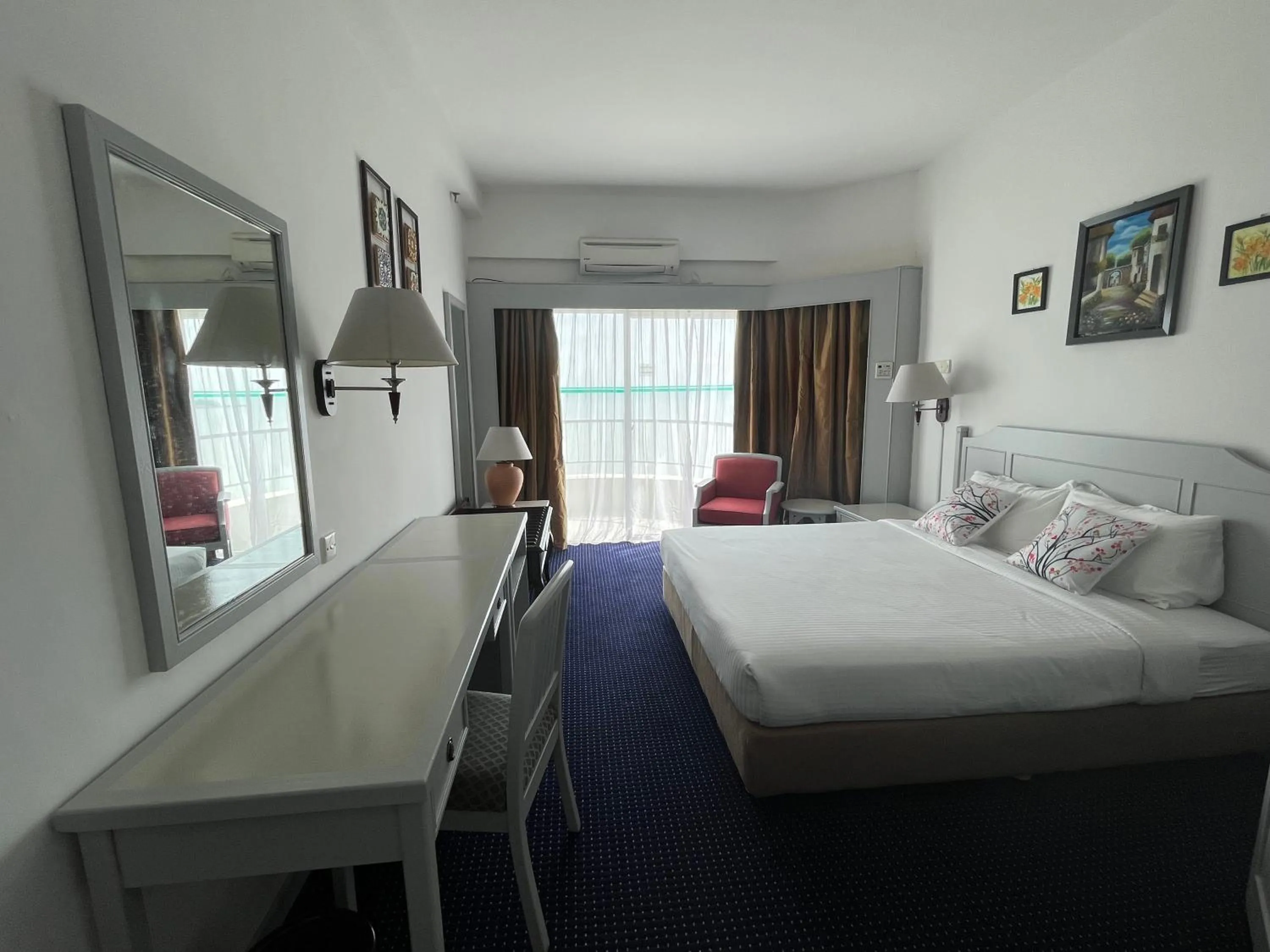 Photo of the whole room, Bed in Paradise by the Sea in Penang by Veron at Rainbow Paradise