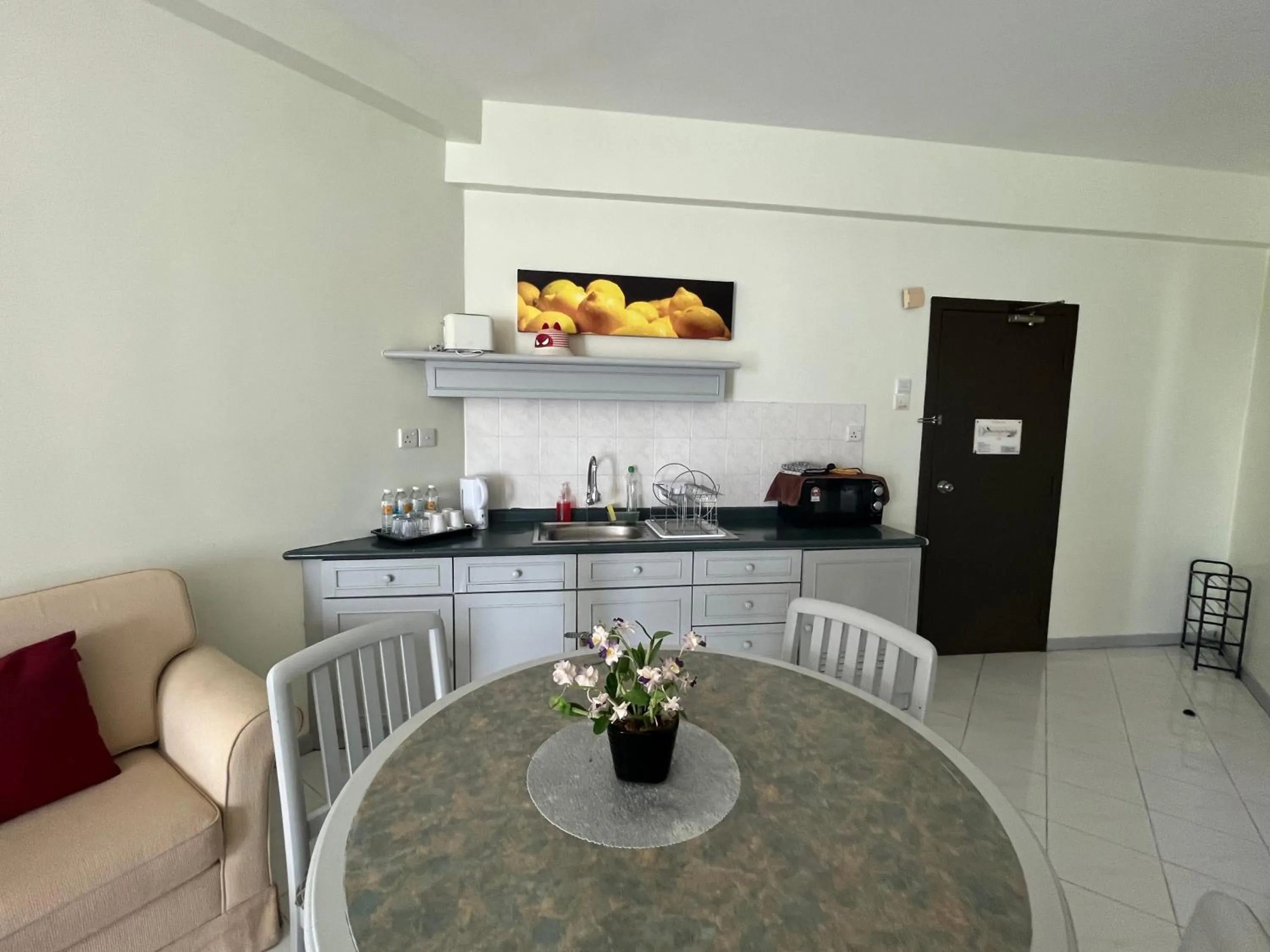 Kitchen or kitchenette in Paradise by the Sea in Penang by Veron at Rainbow Paradise