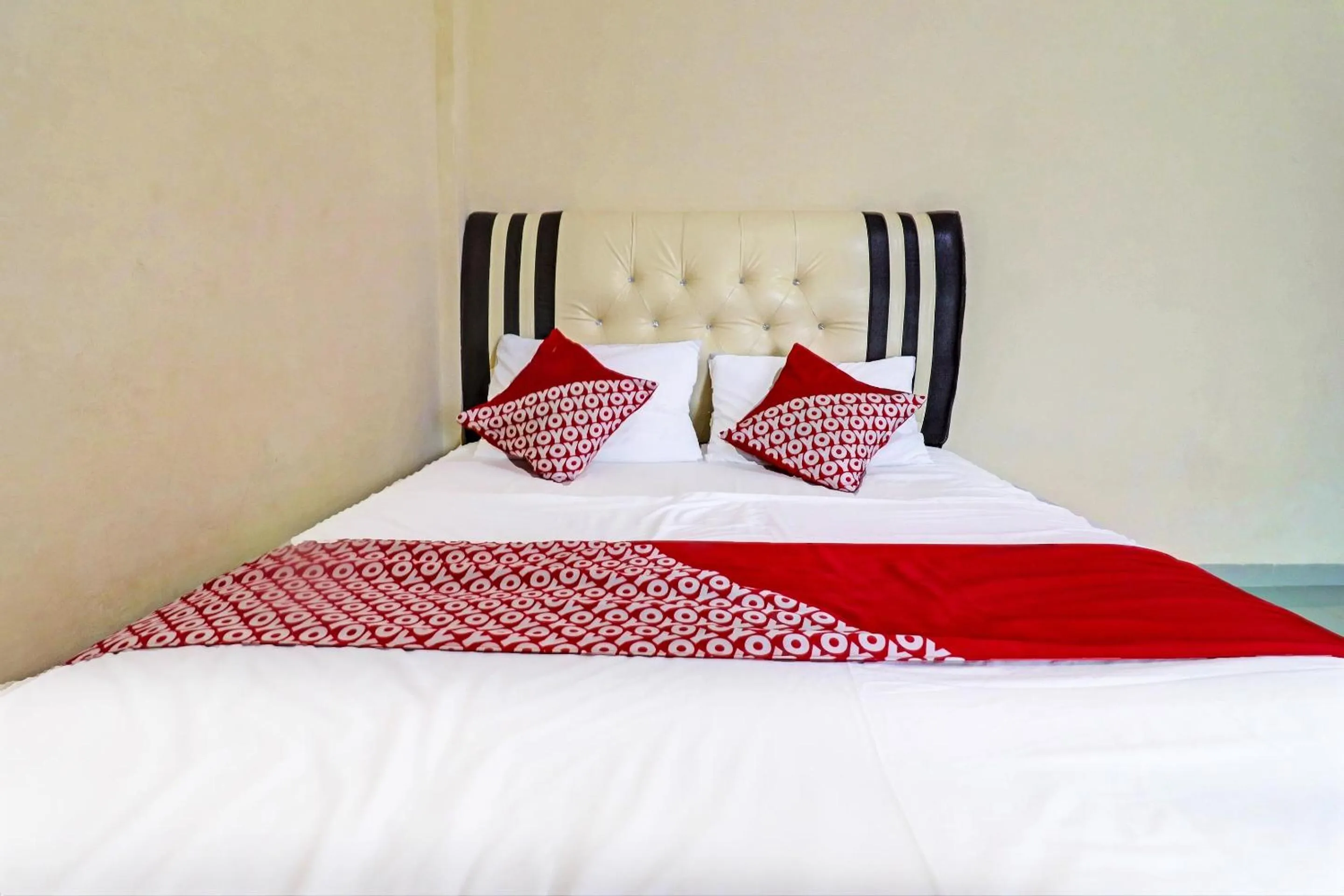 Bedroom in OYO 90945 Arizon Kost