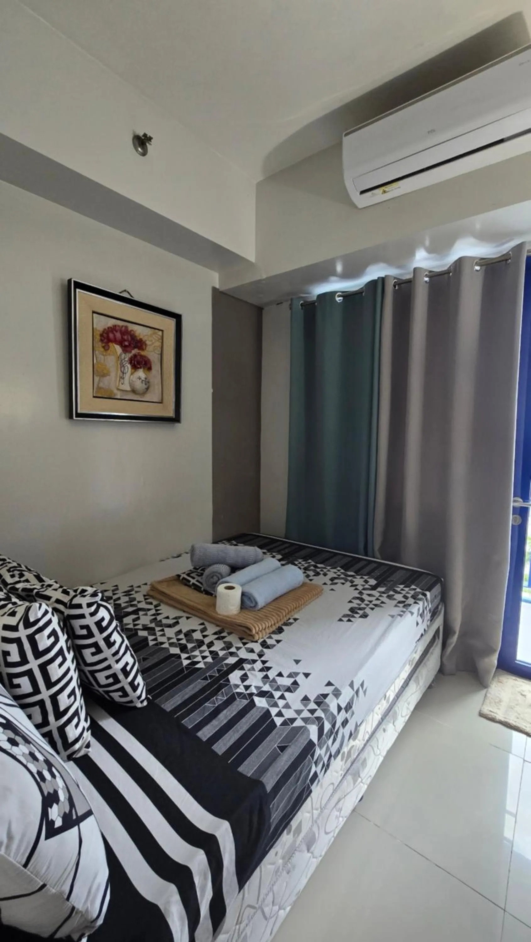 Bed in Sea Residences by EZ Stays