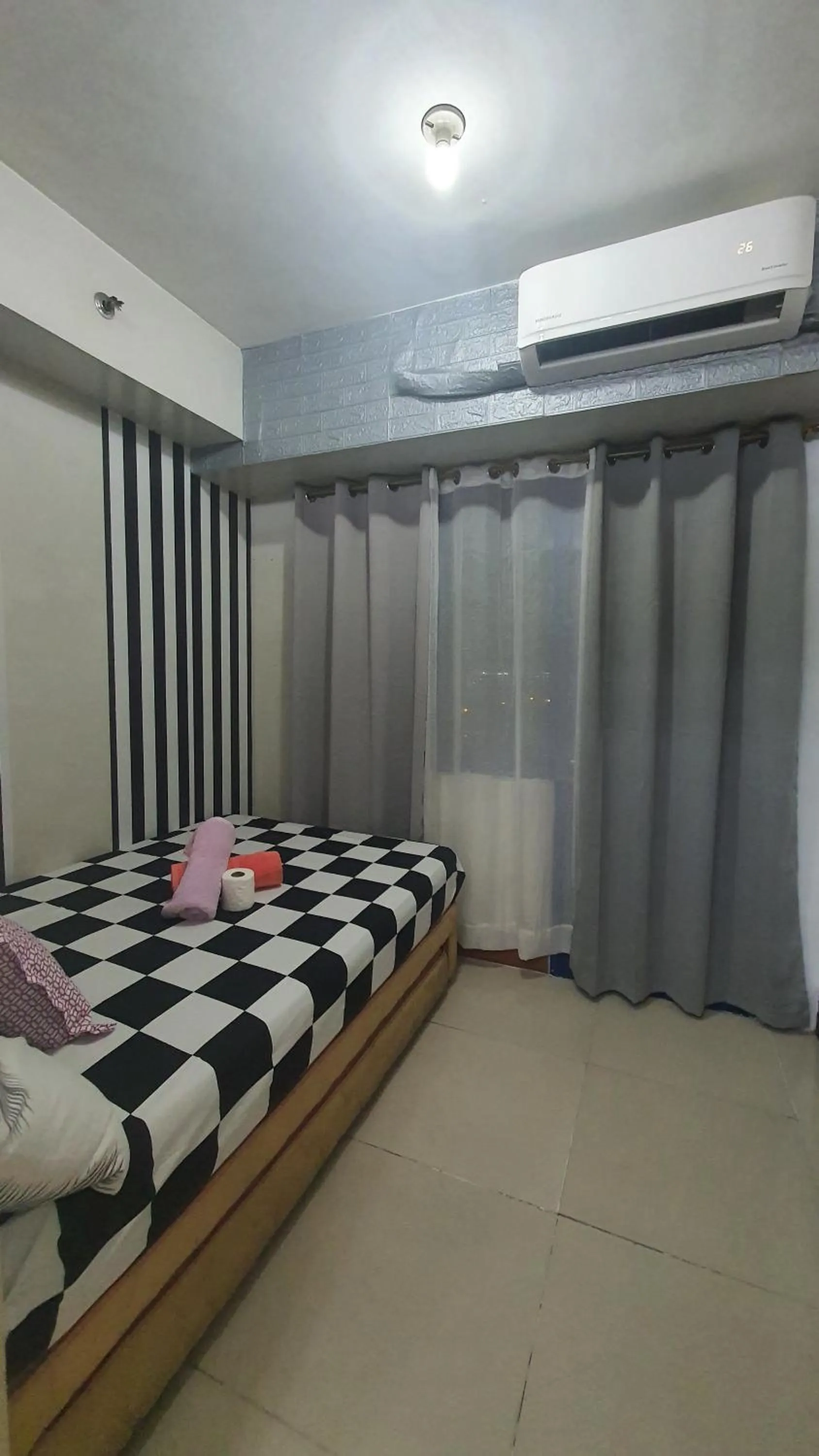 Bed in Sea Residences by EZ Stays