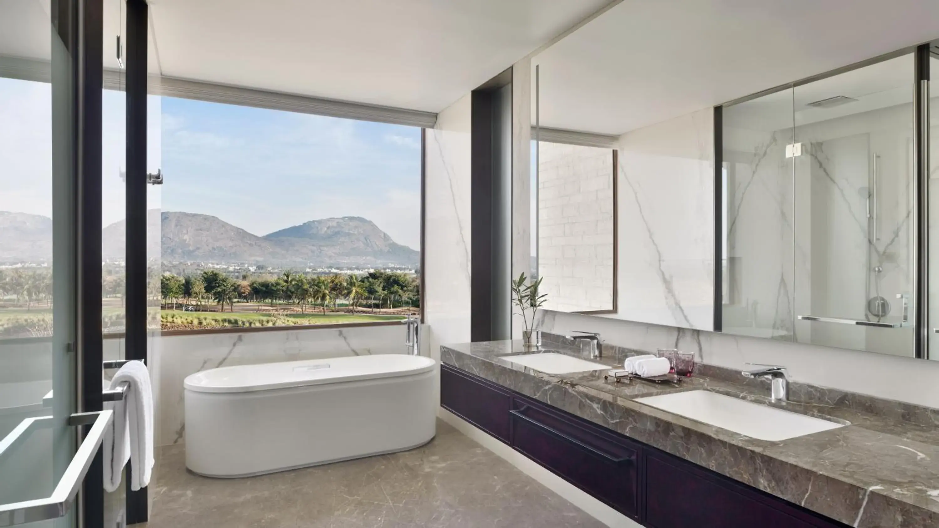 Two Bedroom Family Suite with Pool View – Club Lounge Access with complimentary evening local tea experience - single occupancy in JW Marriott Hotel Bengaluru Prestige Golfshire Resort & Spa Two Bedroom Family Suite with Pool View – Club Lounge Access with complimentary evening local tea experience - single occupancy in JW Marriott Hotel Bengaluru Prestige Golfshire Resort & Spa