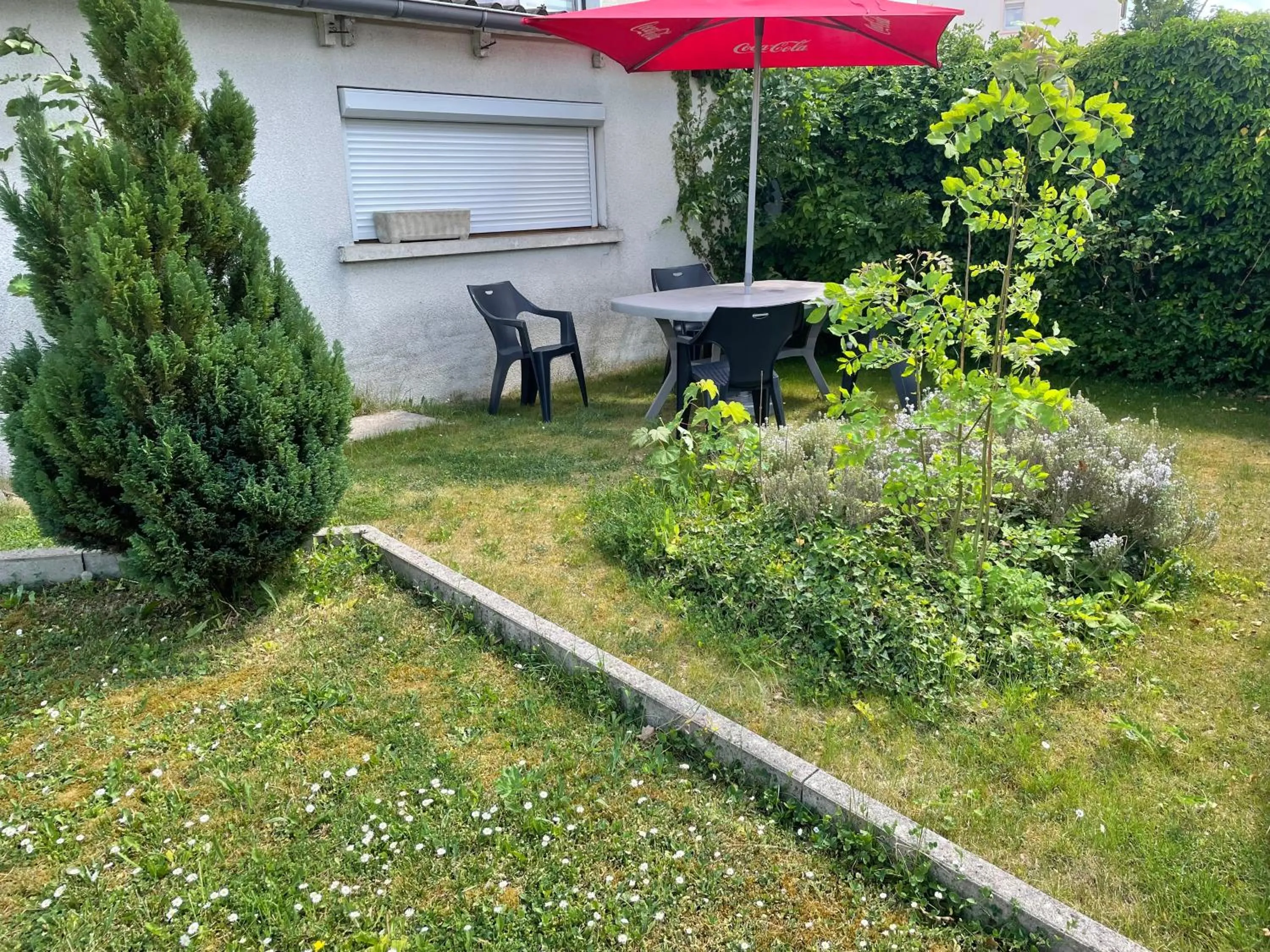 Garden in OLGA Chambre D'hôte "Betty 3"