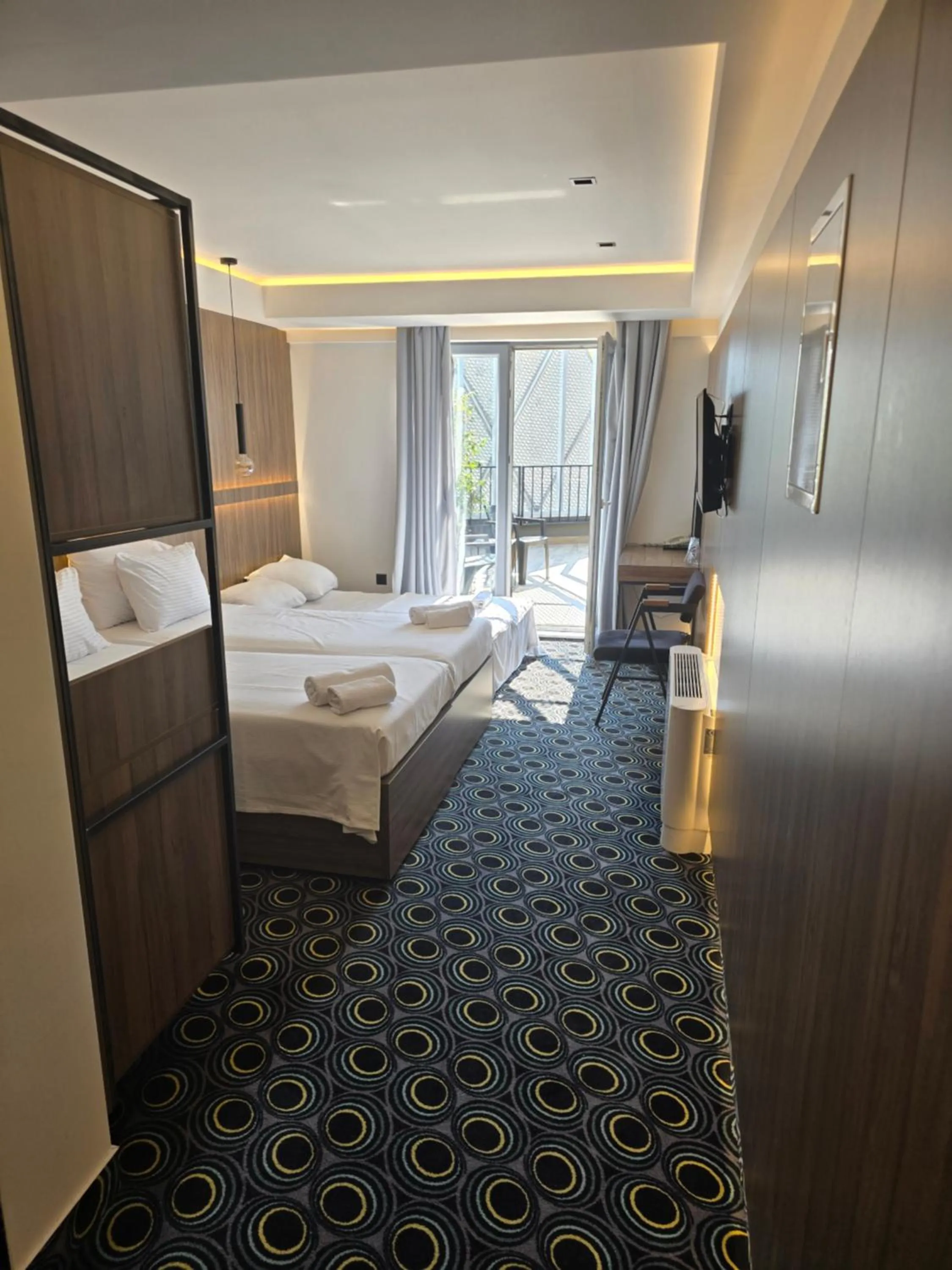 Bed in Hotel Carpe Diem