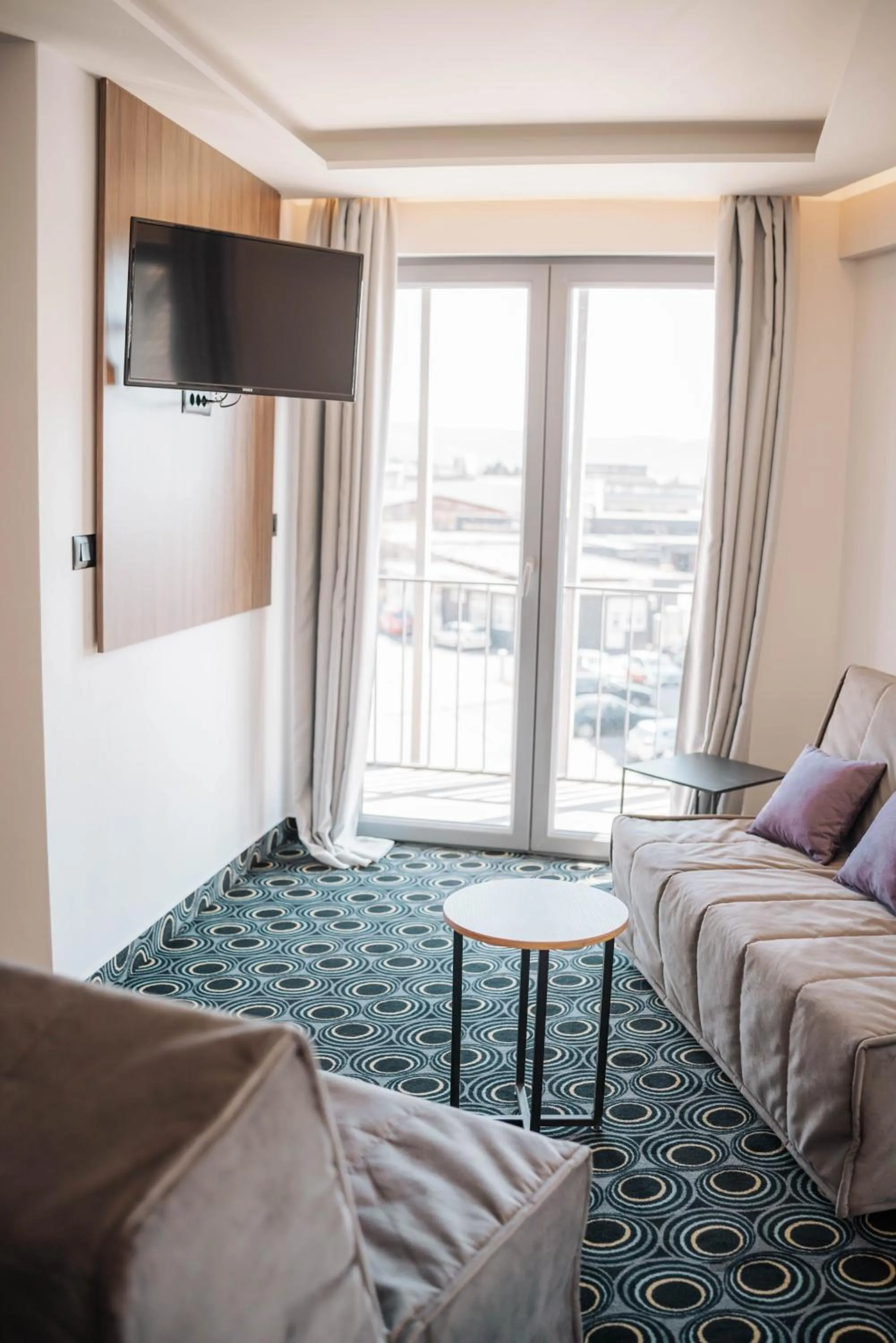 Seating area, Bed in Hotel Carpe Diem