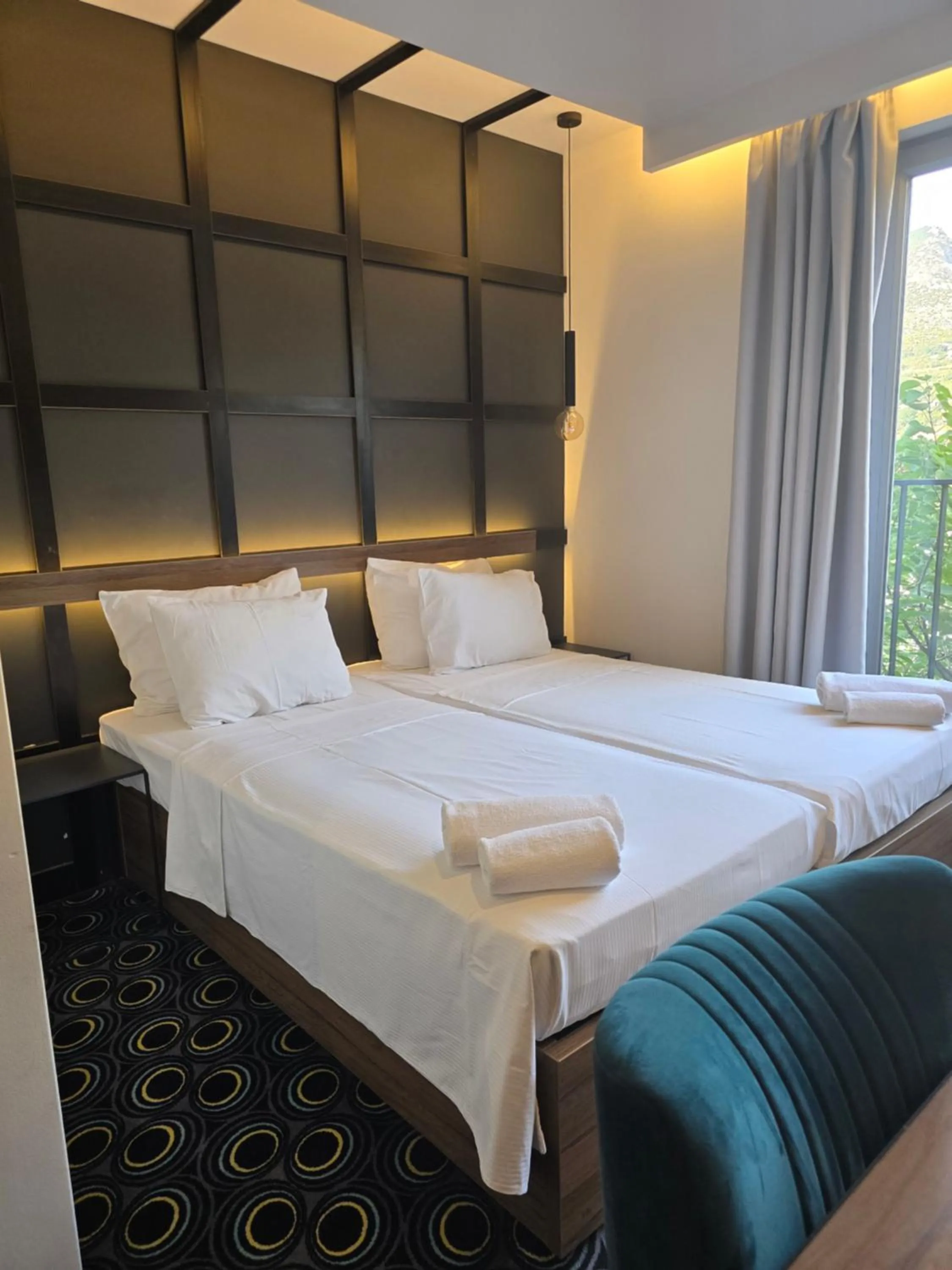 Bed in Hotel Carpe Diem