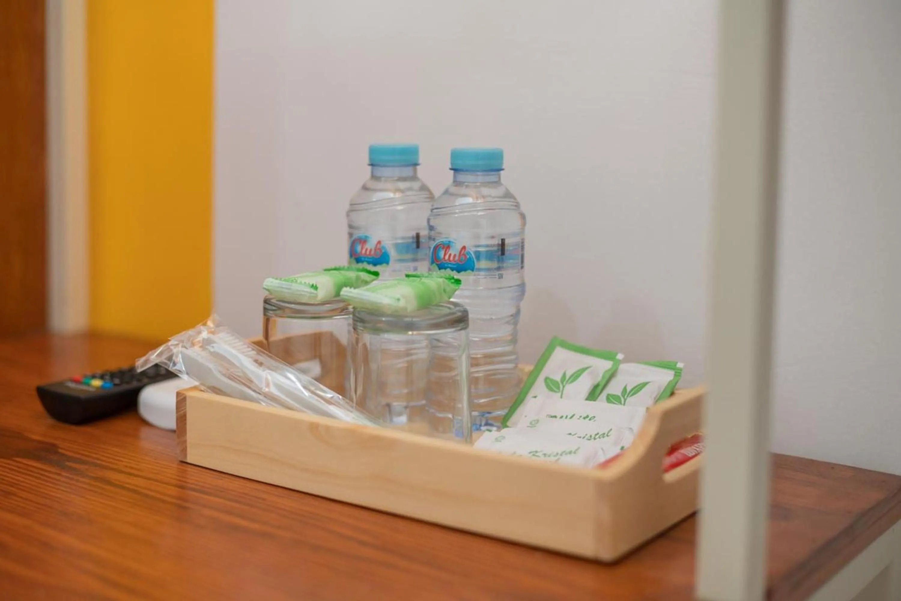 Bedroom in Sans Hotel Queen Batu