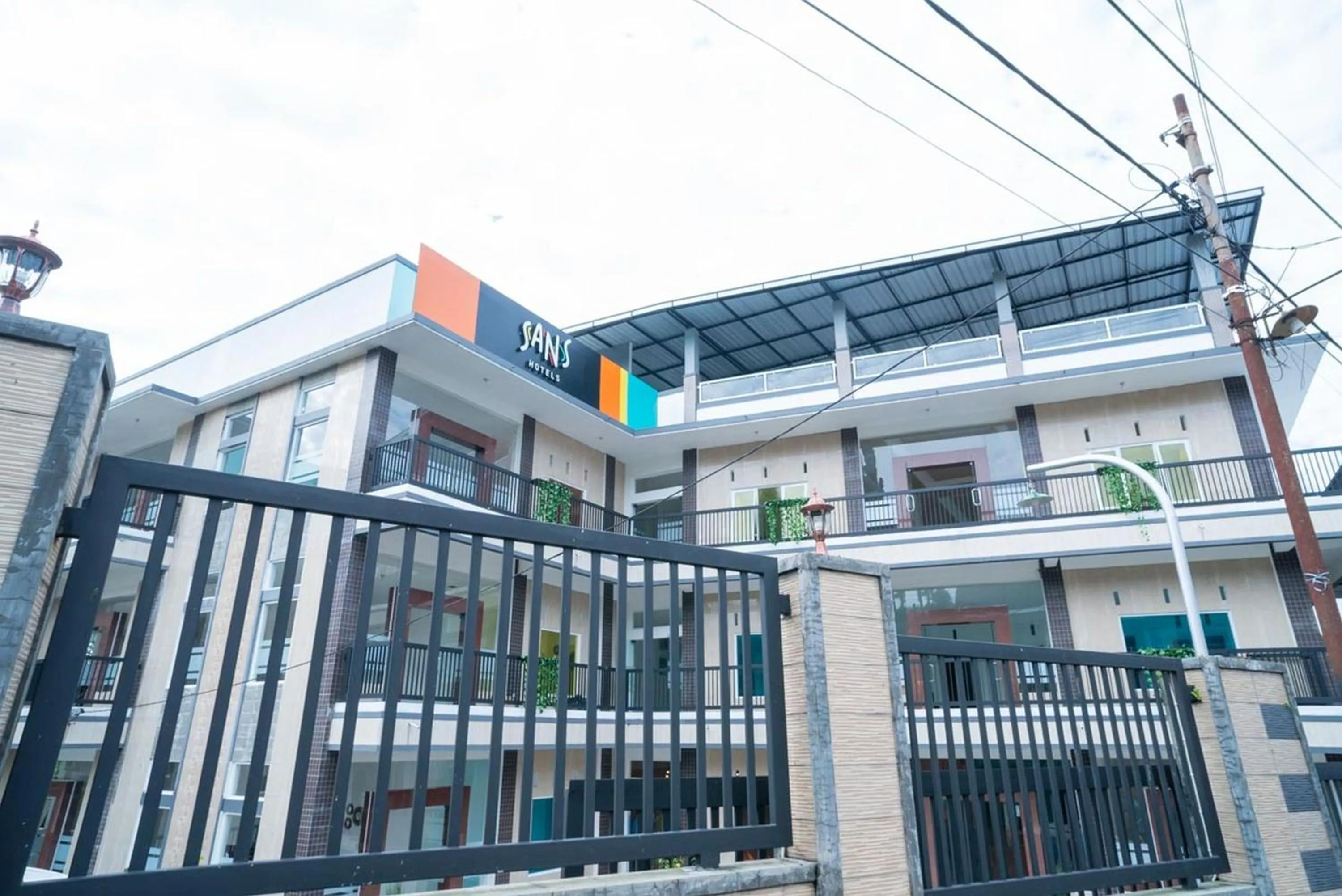 Property building in Sans Hotel Queen Batu