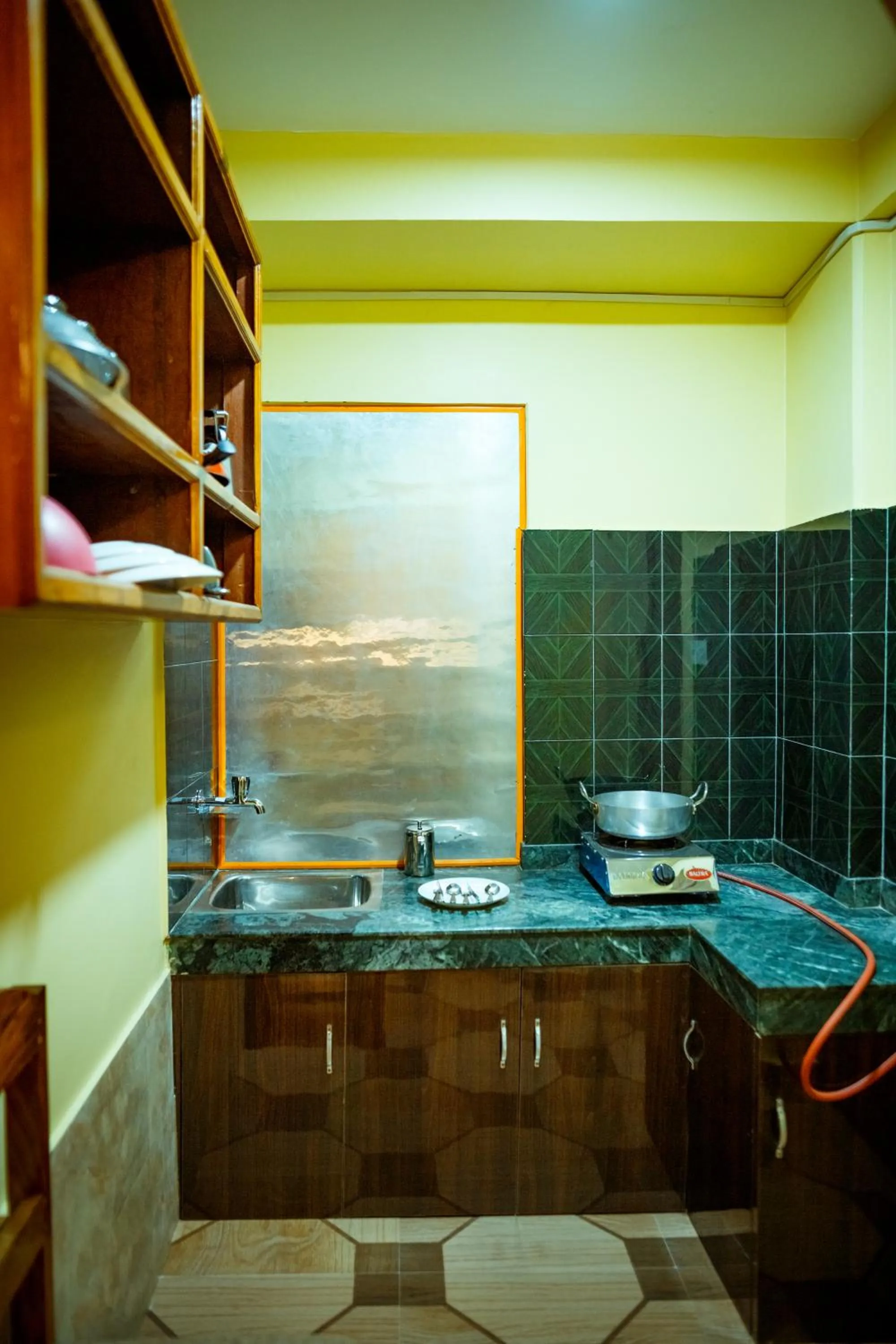 Kitchen or kitchenette in Paradise Boutique Hotel