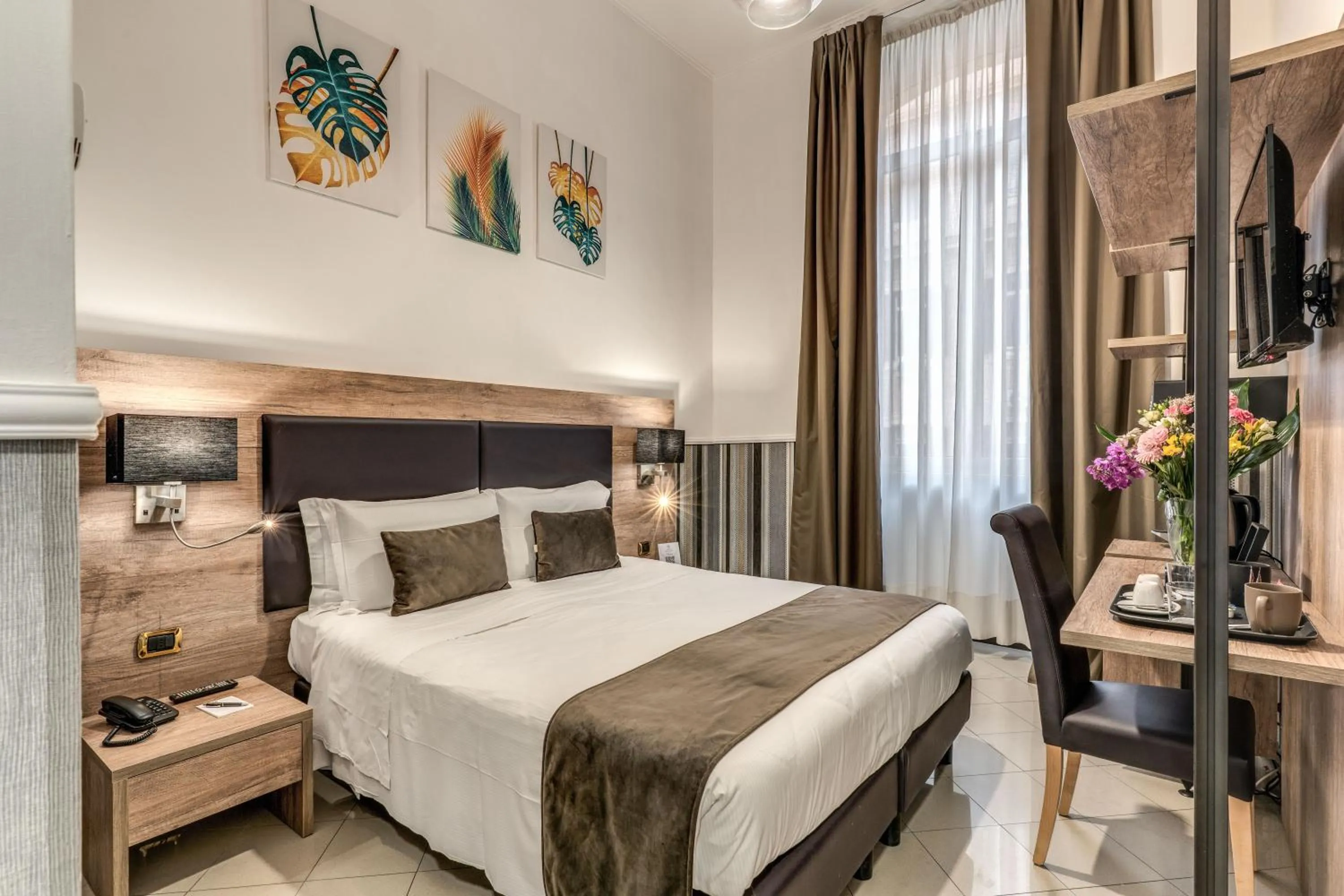 Bed in Hotel Ottaviano Augusto