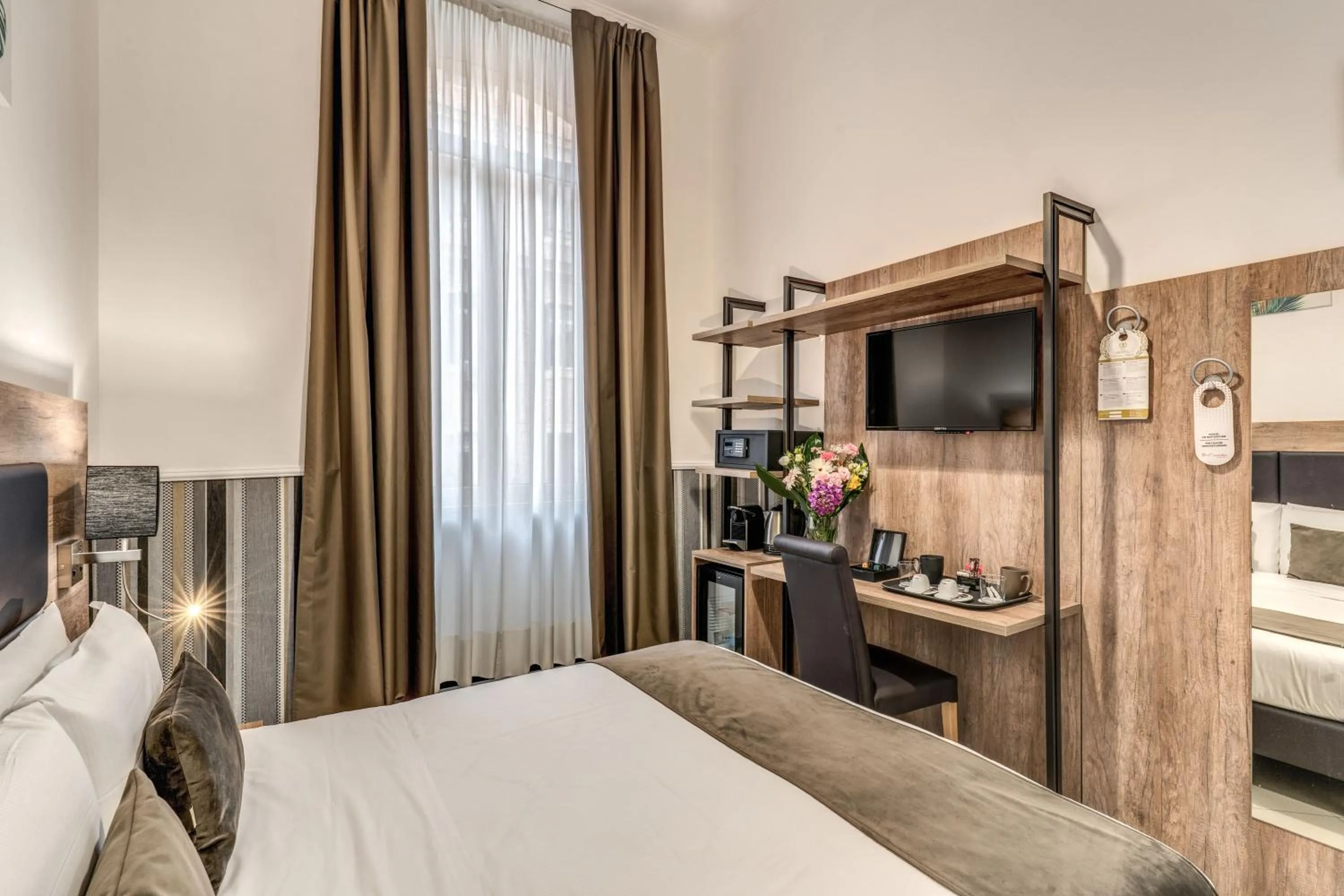 Bed in Hotel Ottaviano Augusto