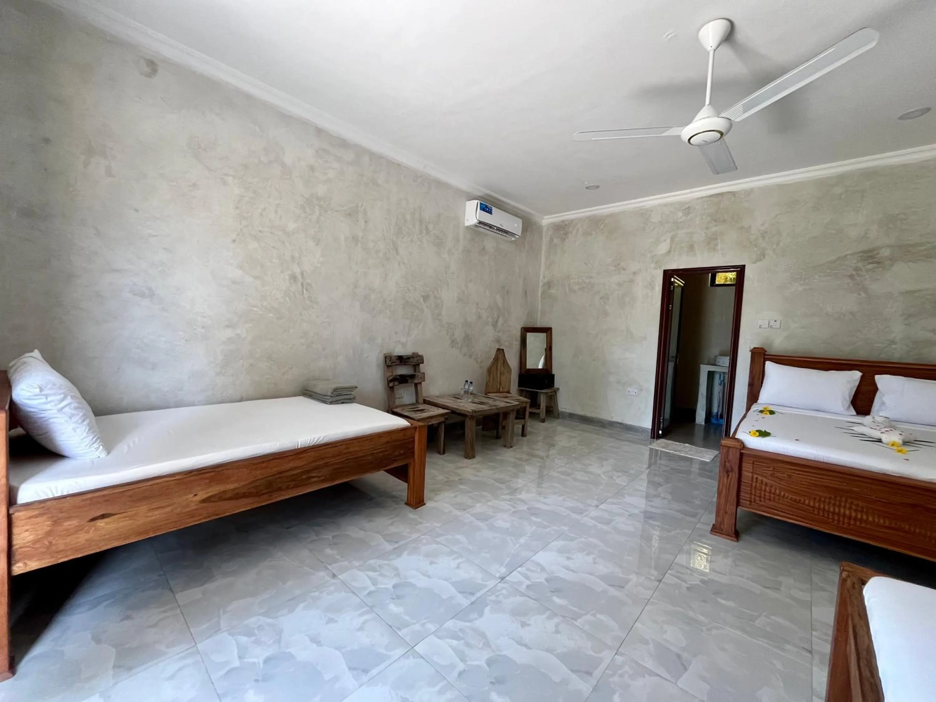 Bedroom in Jambo Beach Hotel Paje