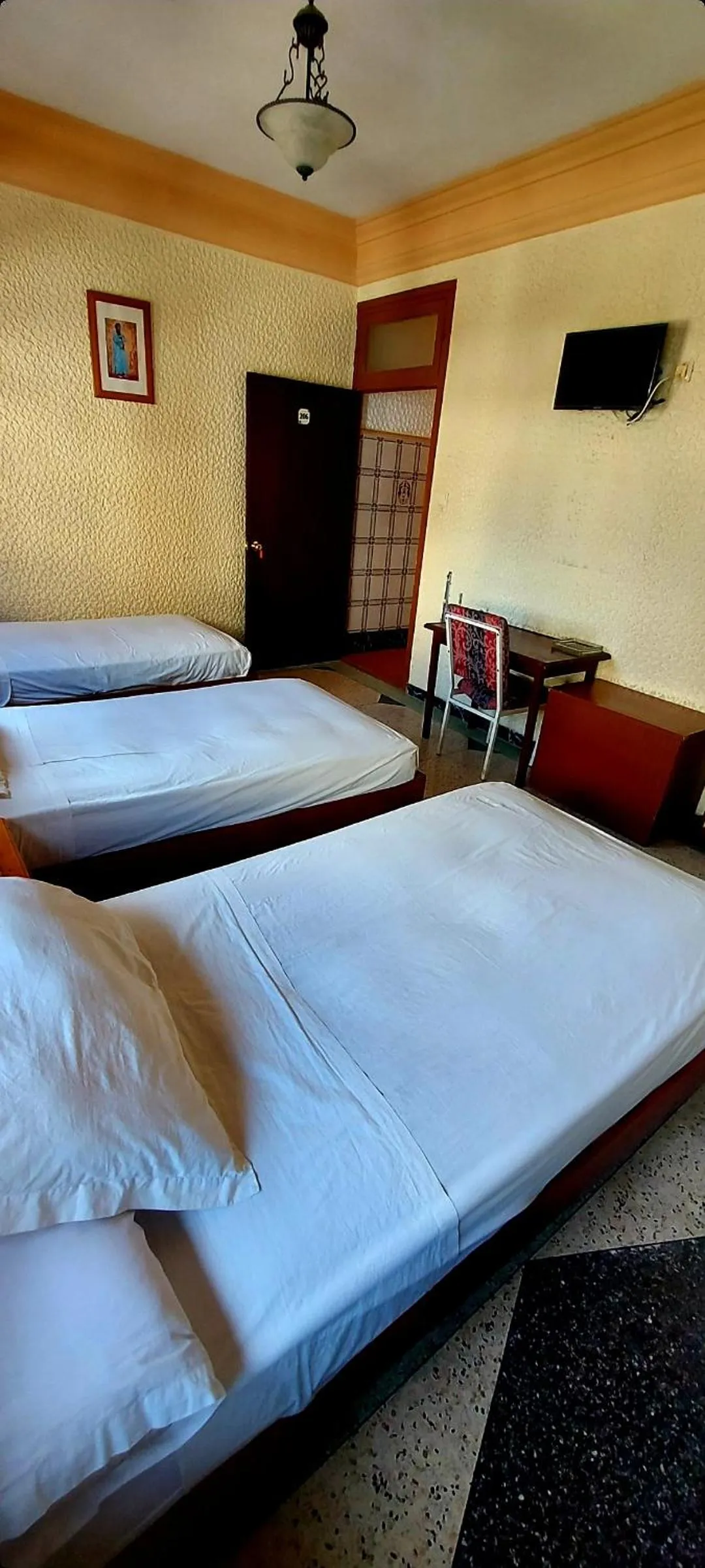 Bed in Hôtel National