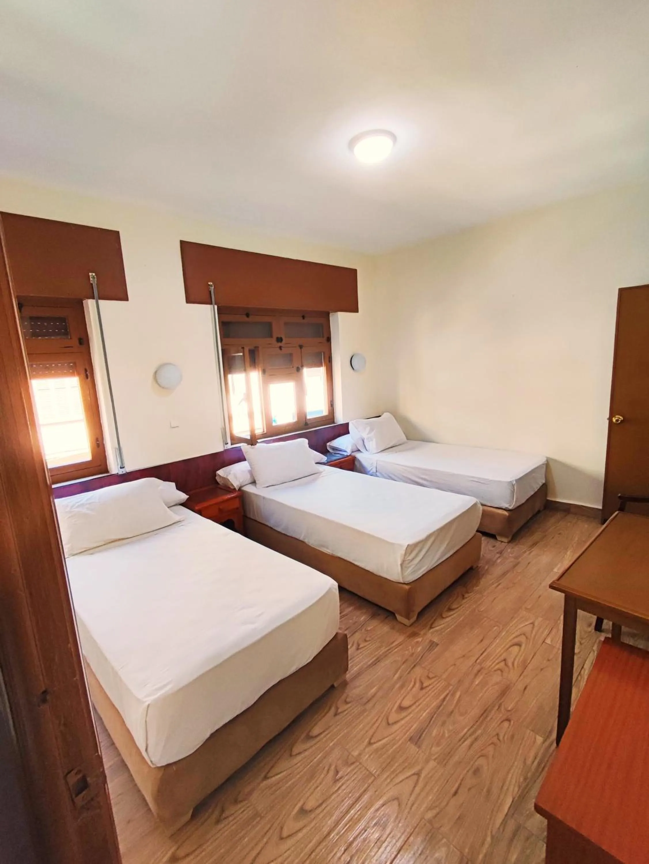 Bed in Hôtel National