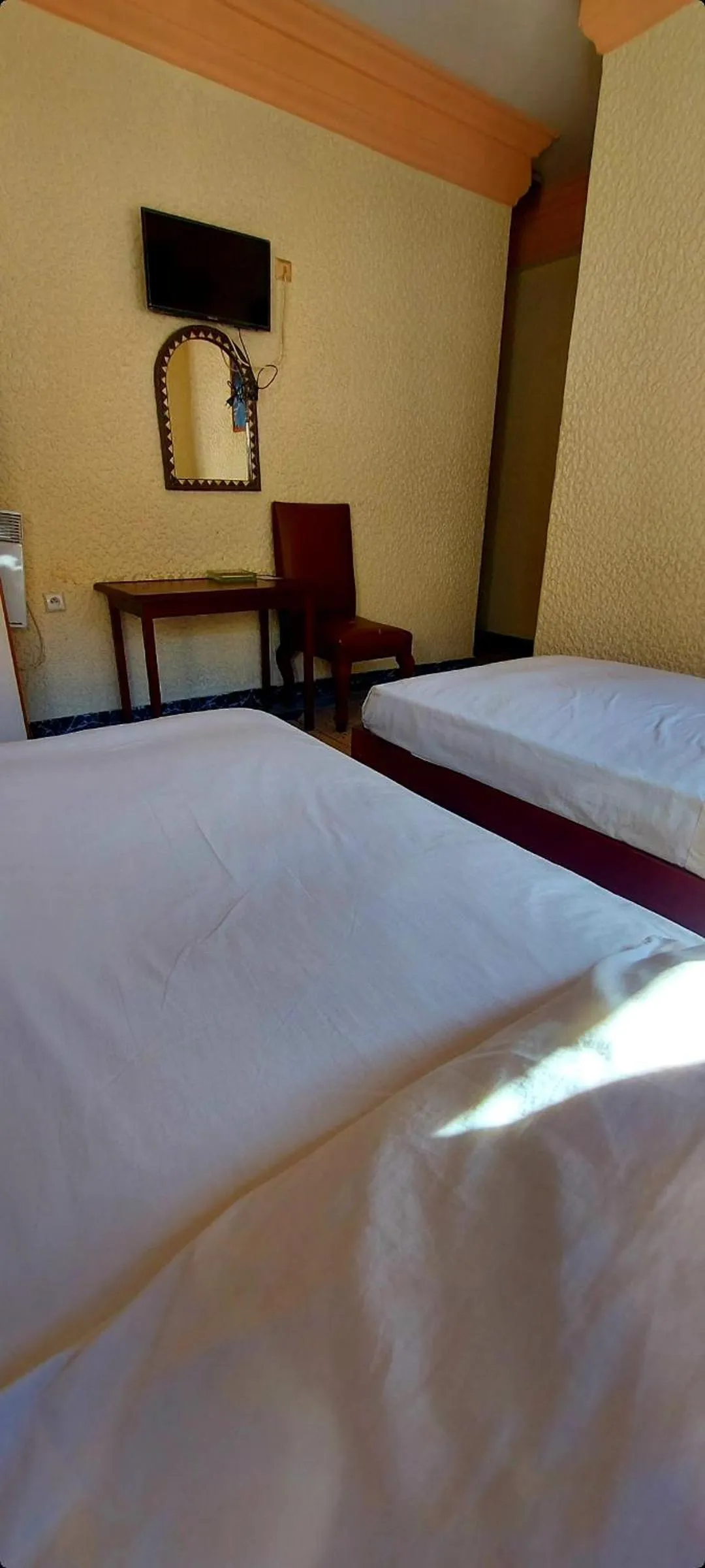 Bed in Hôtel National