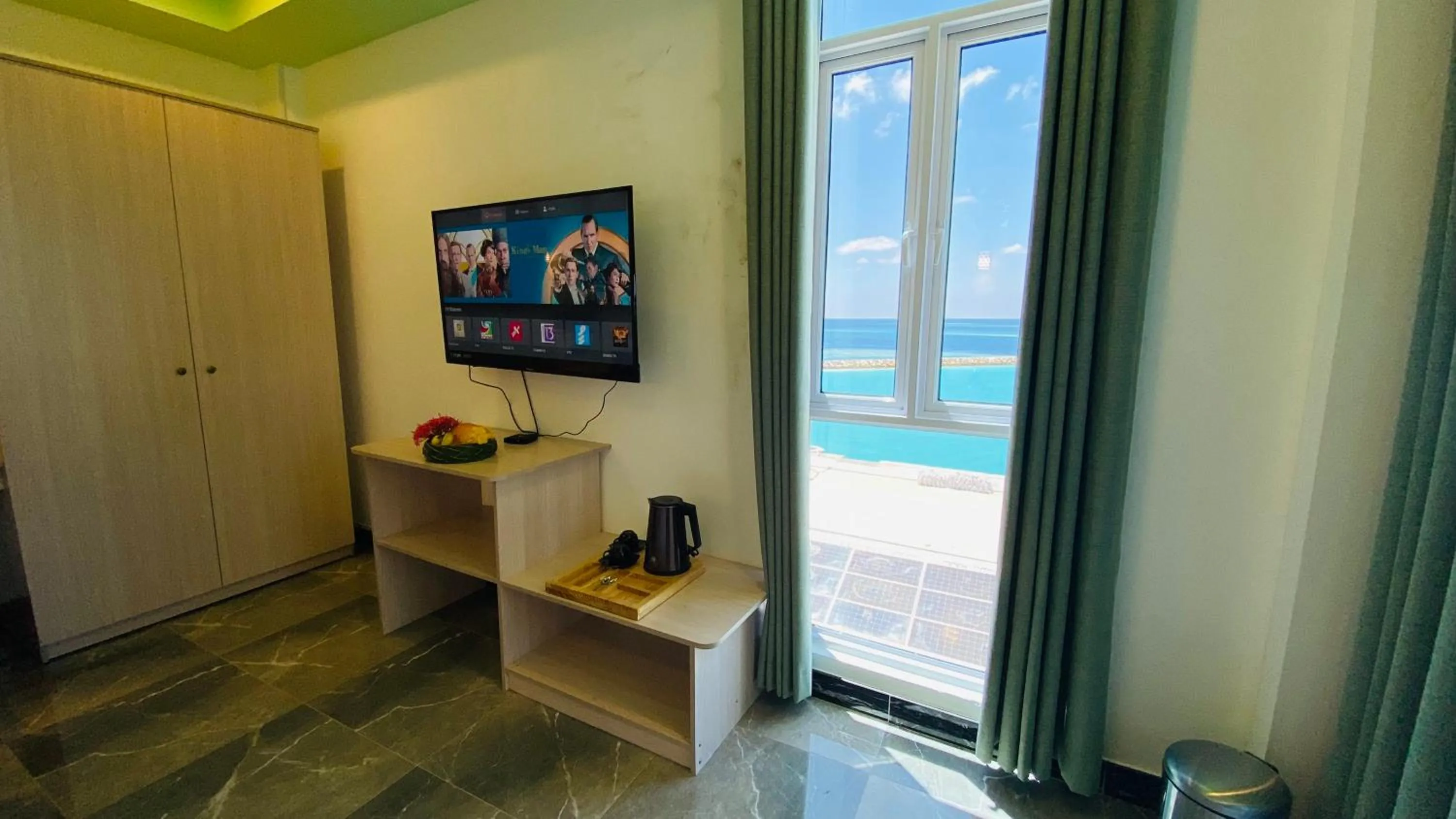 TV and multimedia in Alimas Holiday Retreat Maldives