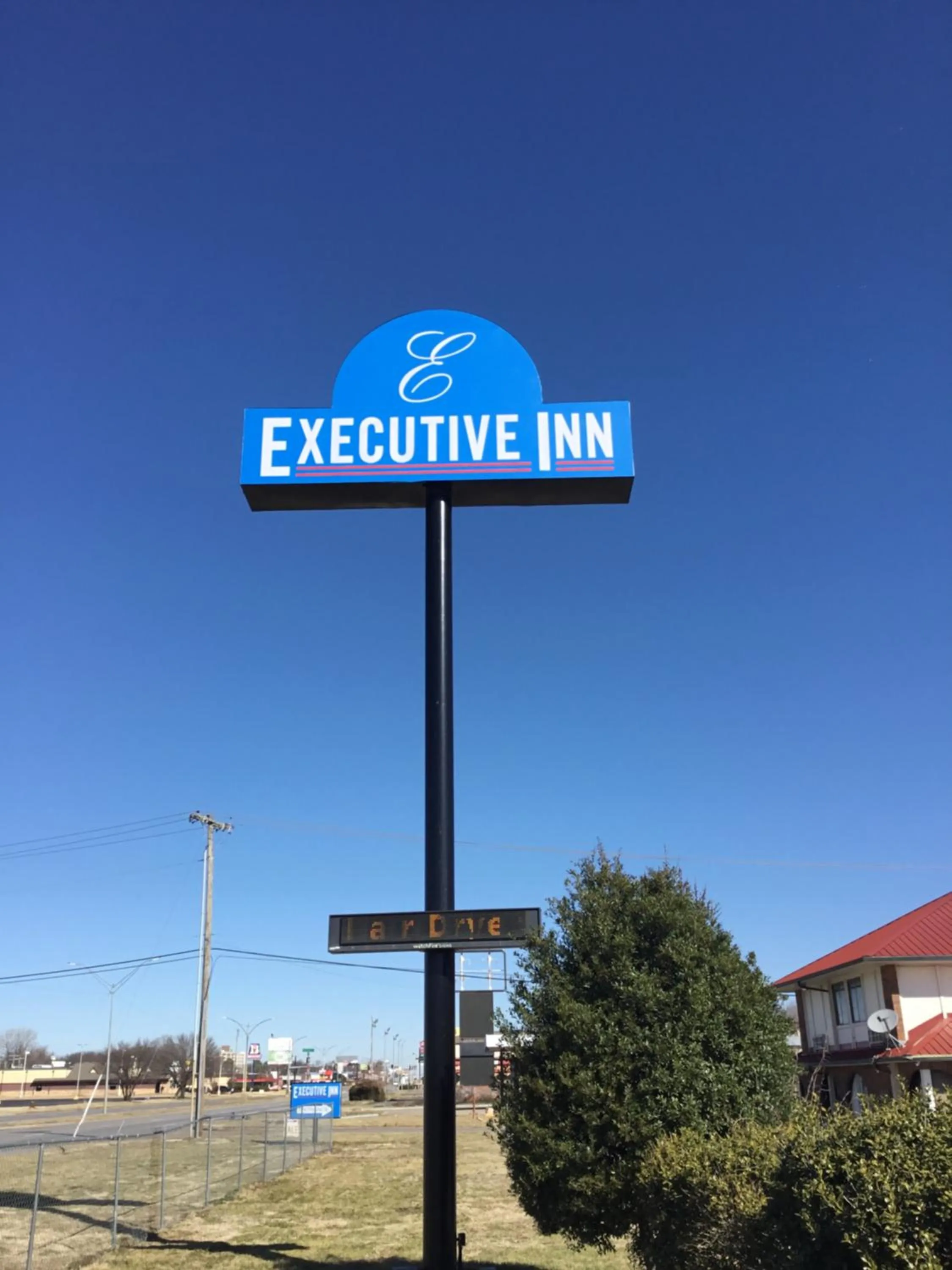 Property logo or sign in Executive Inn