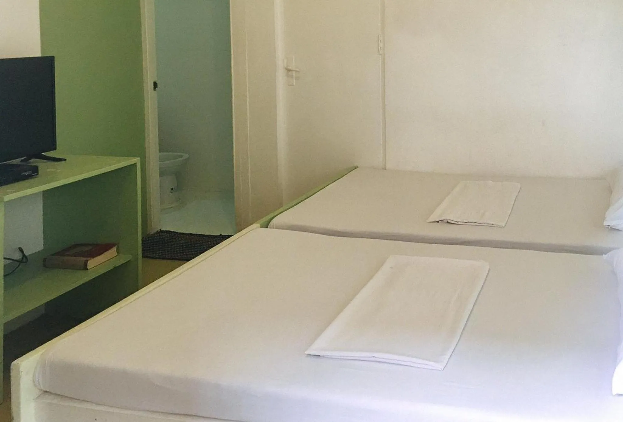 Bedroom, Bed in Mainstreet Pension House by RedDoorz