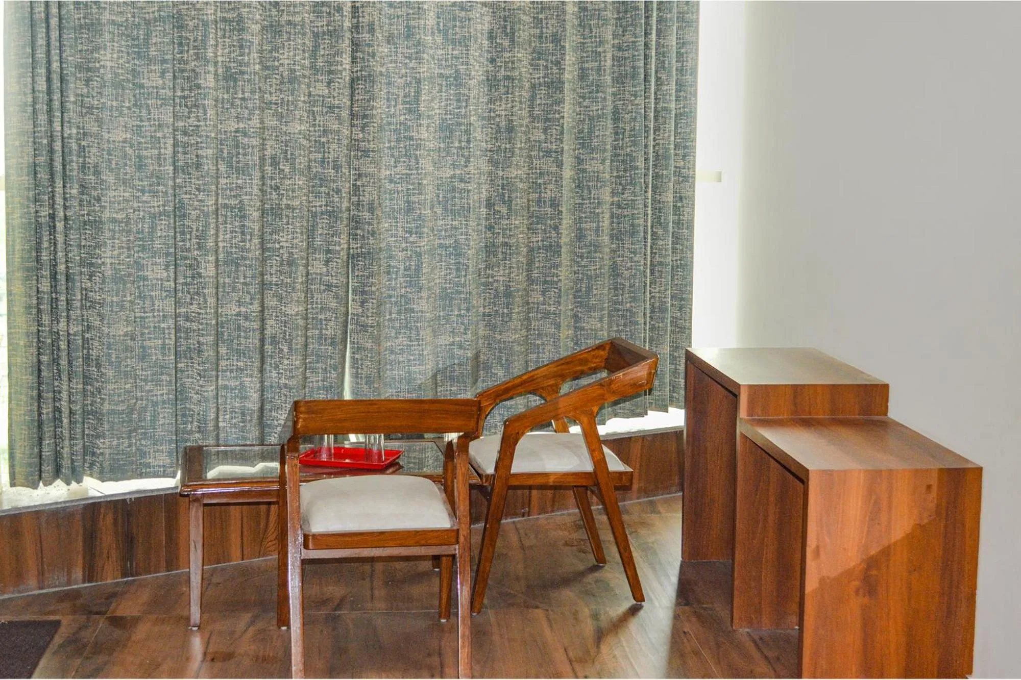 Seating area in FabHotel The Golf Inn