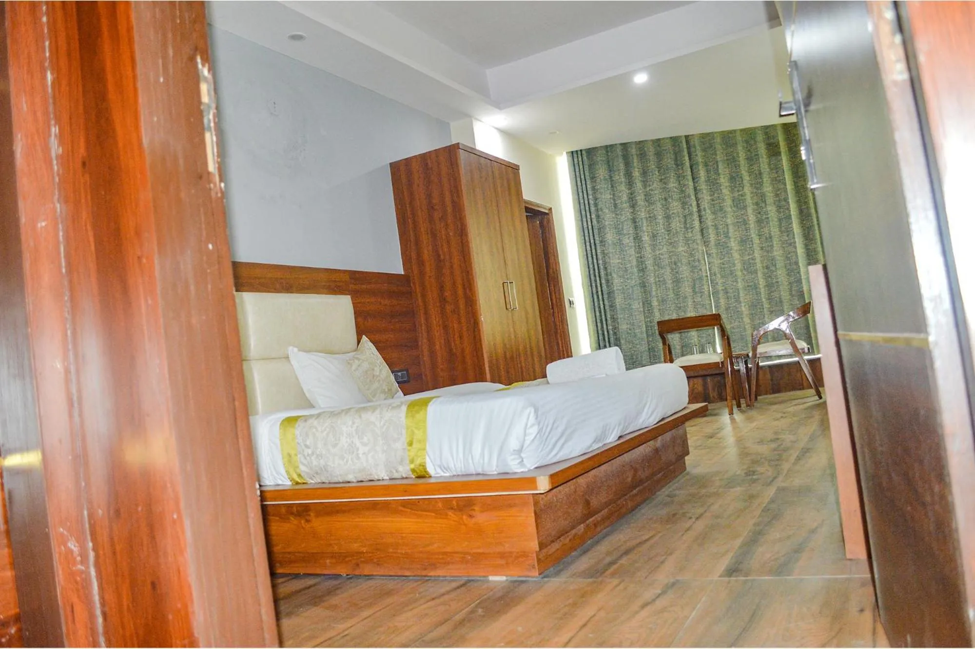 Photo of the whole room, Bed in FabHotel The Golf Inn