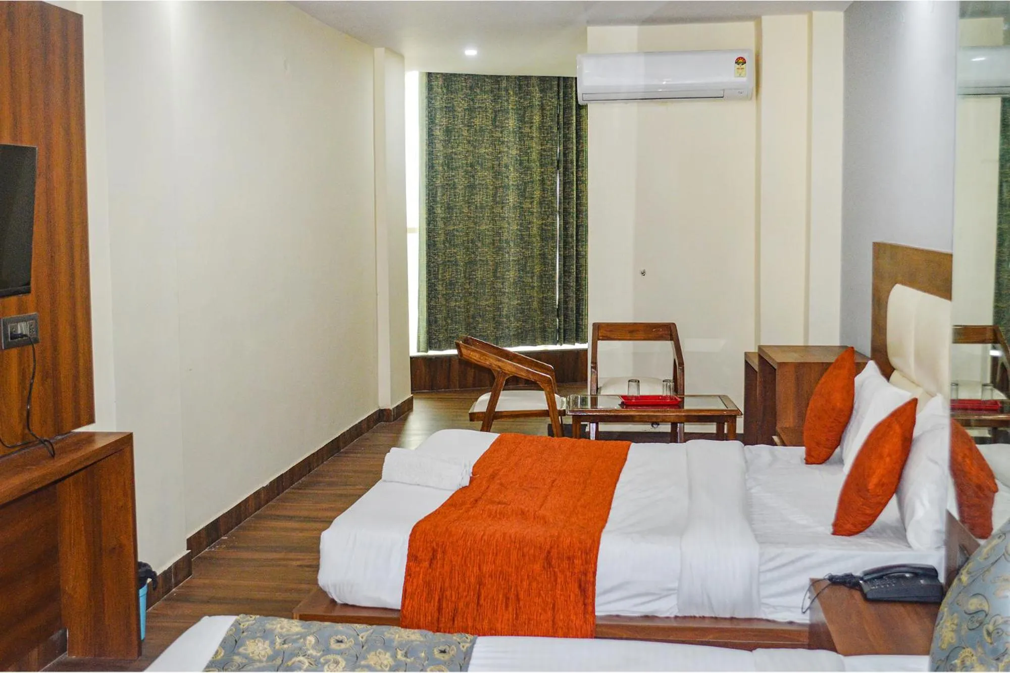 Bed in FabHotel The Golf Inn