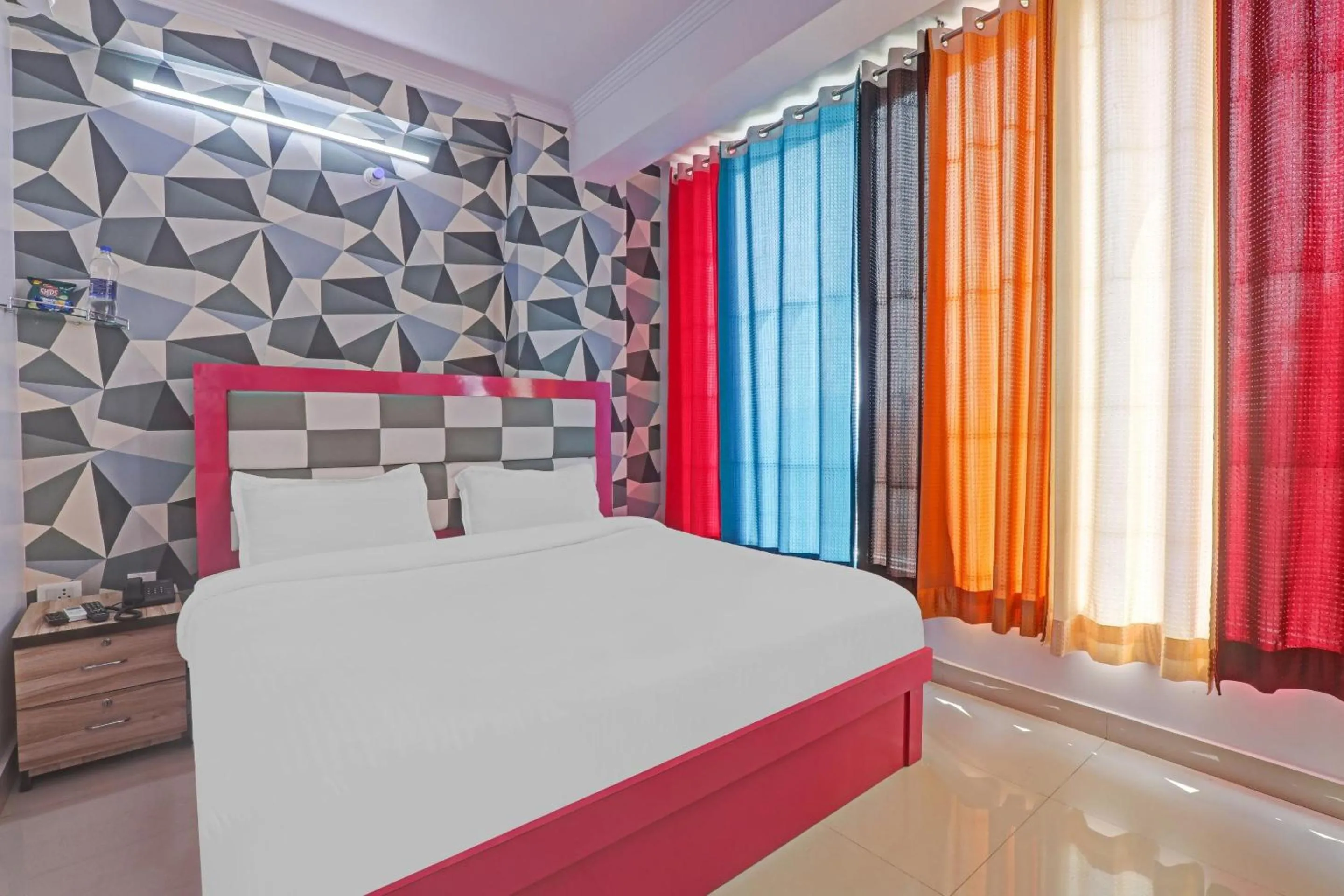 Bedroom in OYO Flagship 86660 Hotel RK Grand