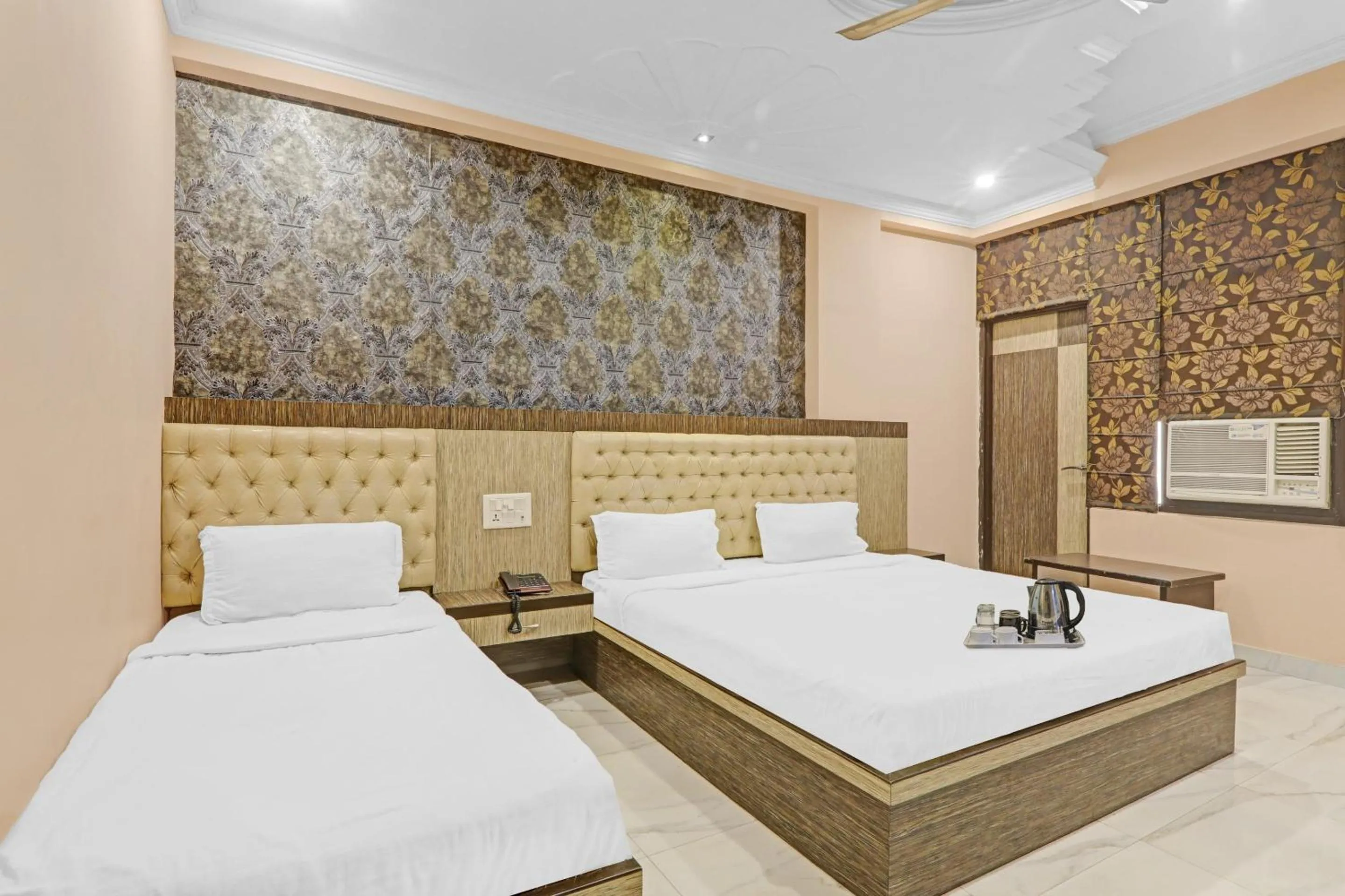 Bedroom, Bed in Super Capital O Townhouse Govinda Royal